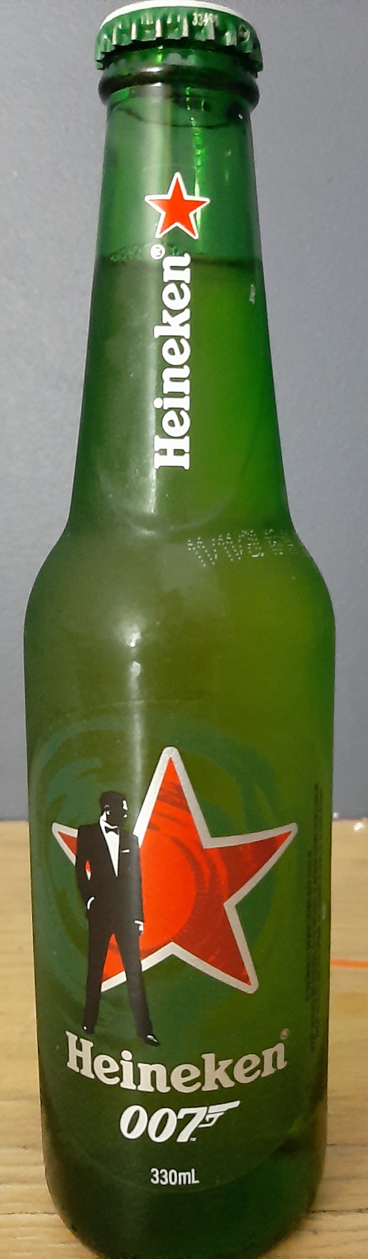 Product placement seamlessly embeds advertising into narrative media, such as this limited-edition Heineken bottle created to capitalize on the brand's integration into the James Bond franchise.