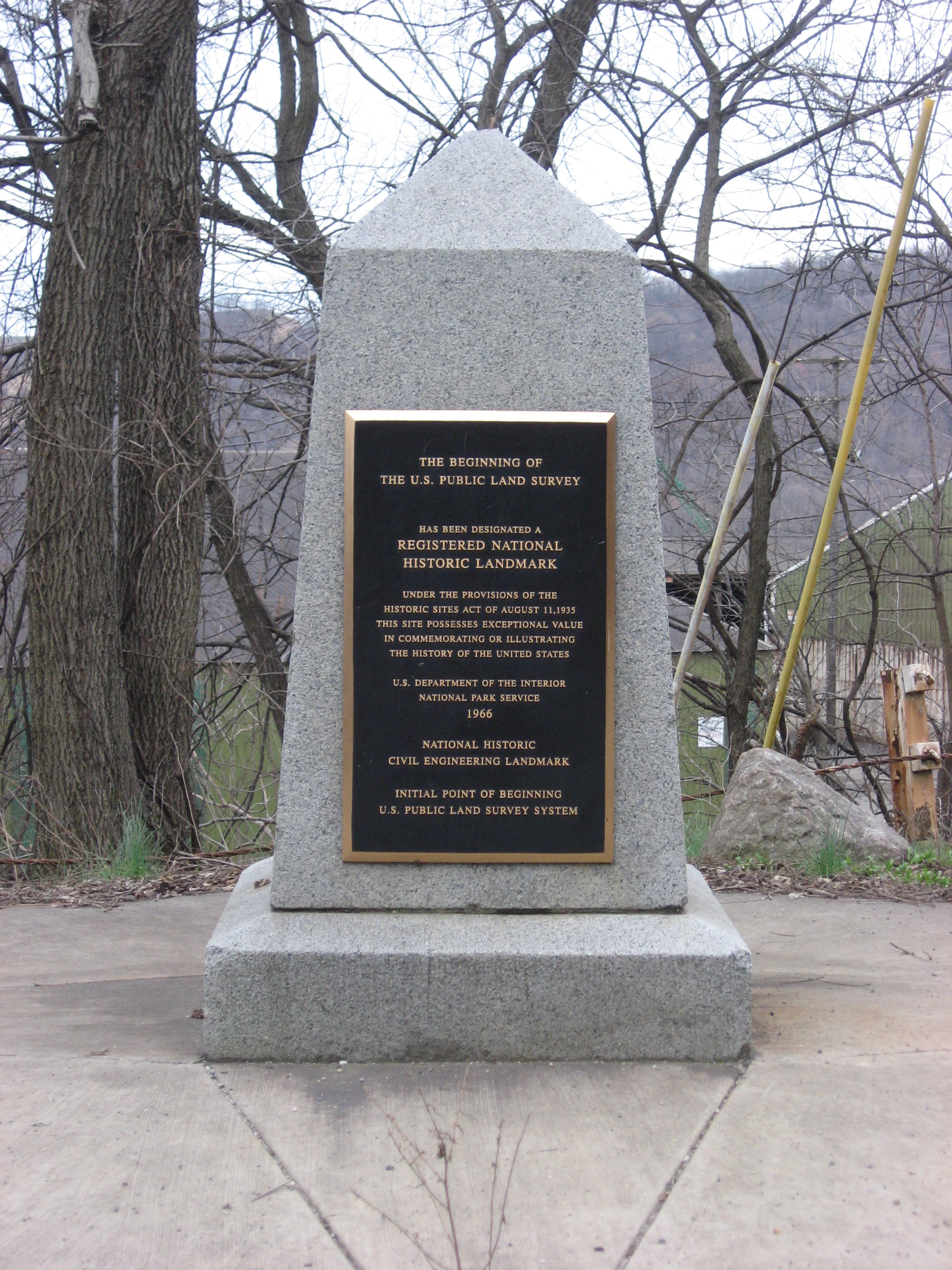 A metes and bounds description relies on a definitive Point of Beginning. The legal description must mathematically trace the property's perimeter from this physical monument and return exactly to it.