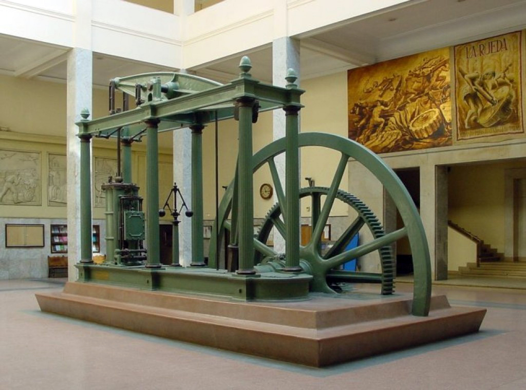 James Watt's improved steam engine design, which replaced reliance on water and wind power, enabling the massive scaling and mechanization of factories.