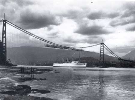A suspension bridge under construction, lacking its central span, visualizes the core concept of a limit: the structural trajectory clearly identifies the exact coordinates of the missing piece.