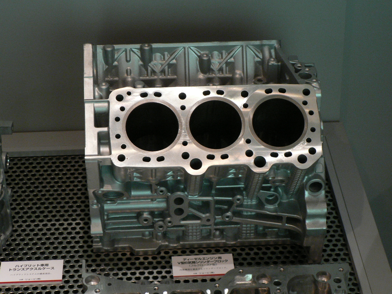 A modern engine block. Just as the engine block serves as the mechanical foundation of a vehicle, robust storage architecture forms the performance foundation of cloud applications.