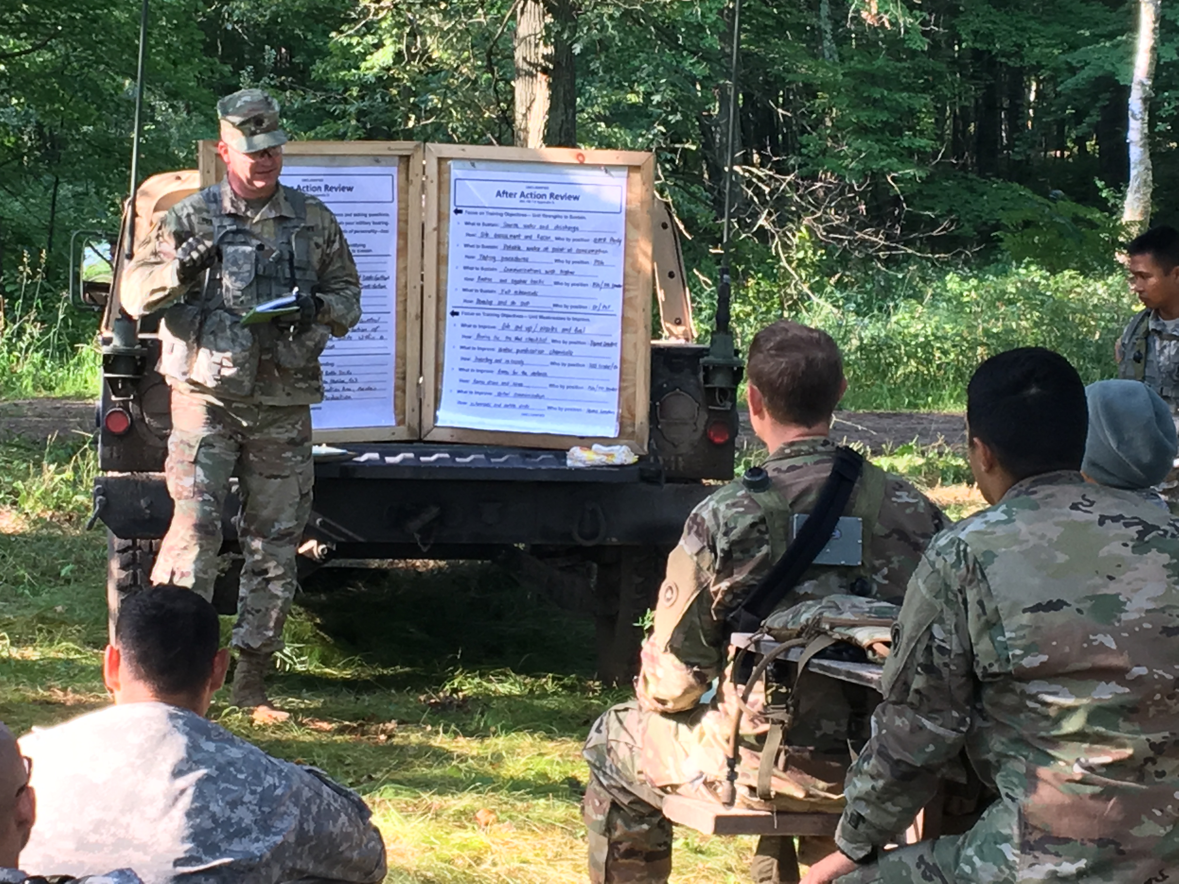 A formal After-Action Review (AAR) session being conducted to document the outcomes, operational gaps, and lessons learned from a response exercise.