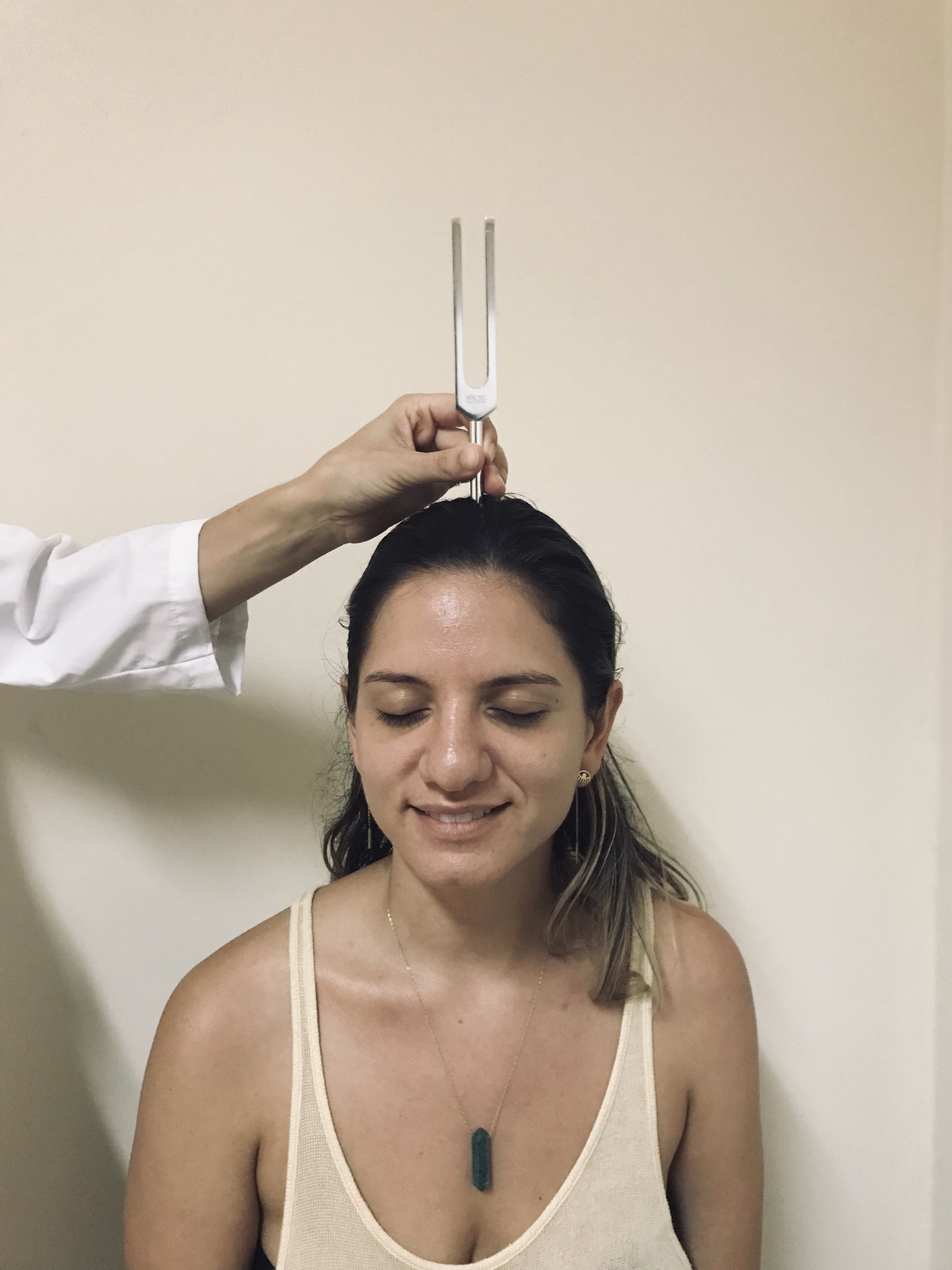 The Weber test evaluates unilateral hearing loss by placing a vibrating tuning fork squarely on the midline of the client's head to assess bone conduction.