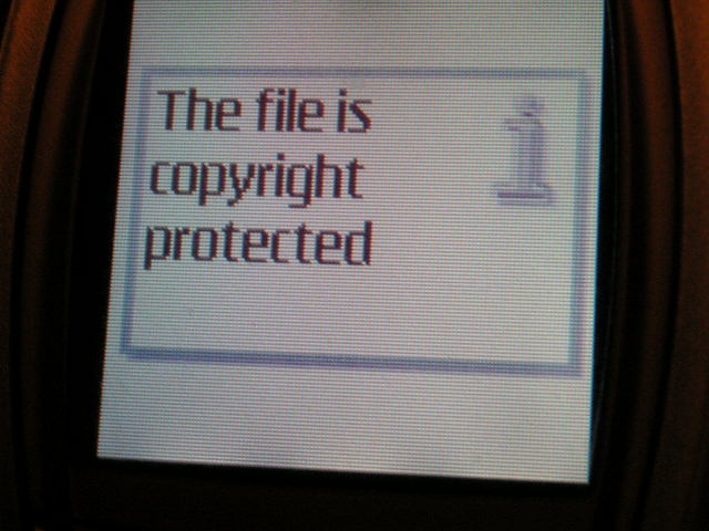 Digital Rights Management (DRM) acts as a cryptographic lock, restricting unauthorized copying or modification of digital media to enforce licensing agreements.