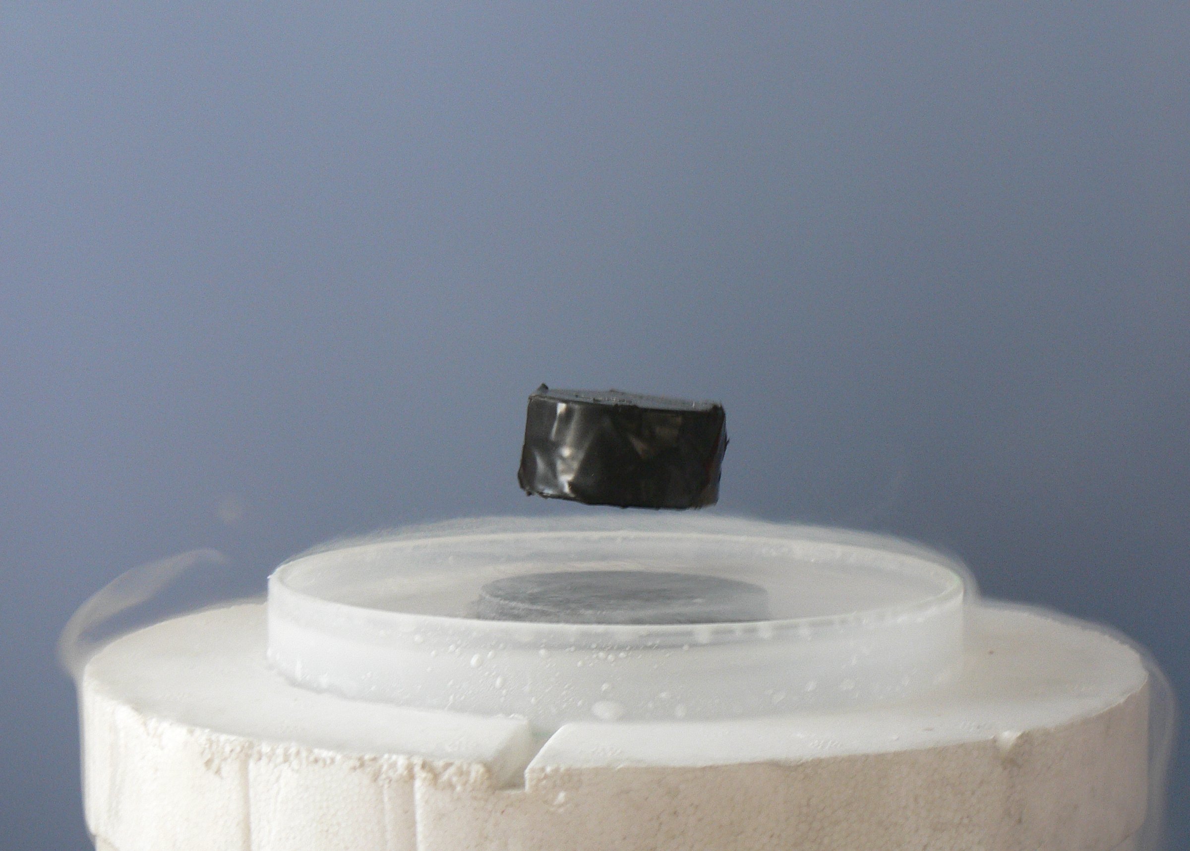 Just as invisible physical forces like electromagnetism (demonstrated here by magnetic levitation) govern physical bodies, the invisible legal force of agency governs liability and duty in real estate.