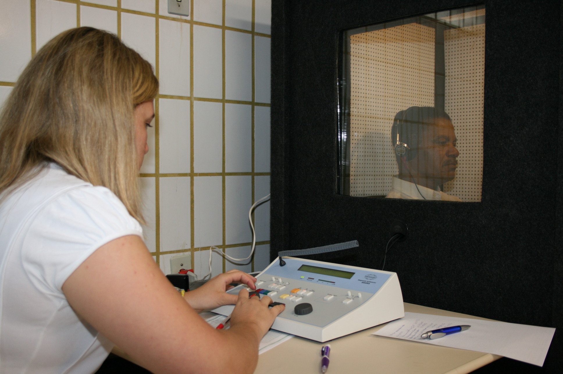 Objective disability categories like hearing loss are diagnosed using specific physiological benchmarks—such as an audiometric hearing test in a sound-proof testing booth—largely removing subjective educator perception from the diagnostic process.