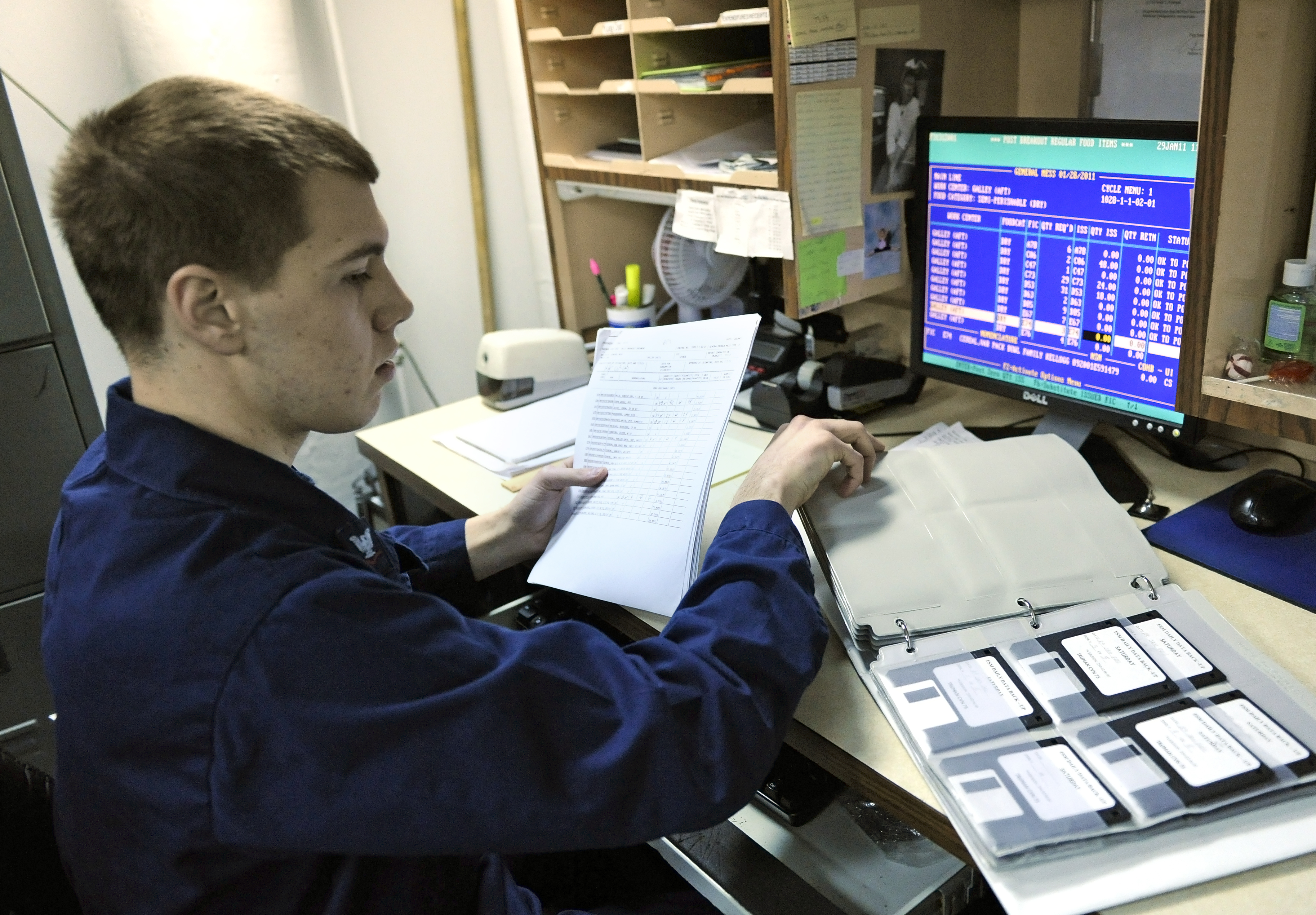 A legacy MS-DOS system in use by the US Navy. When mission-critical legacy applications cannot be patched without breaking functionality, analysts must implement compensating controls like network segmentation to isolate the risk.