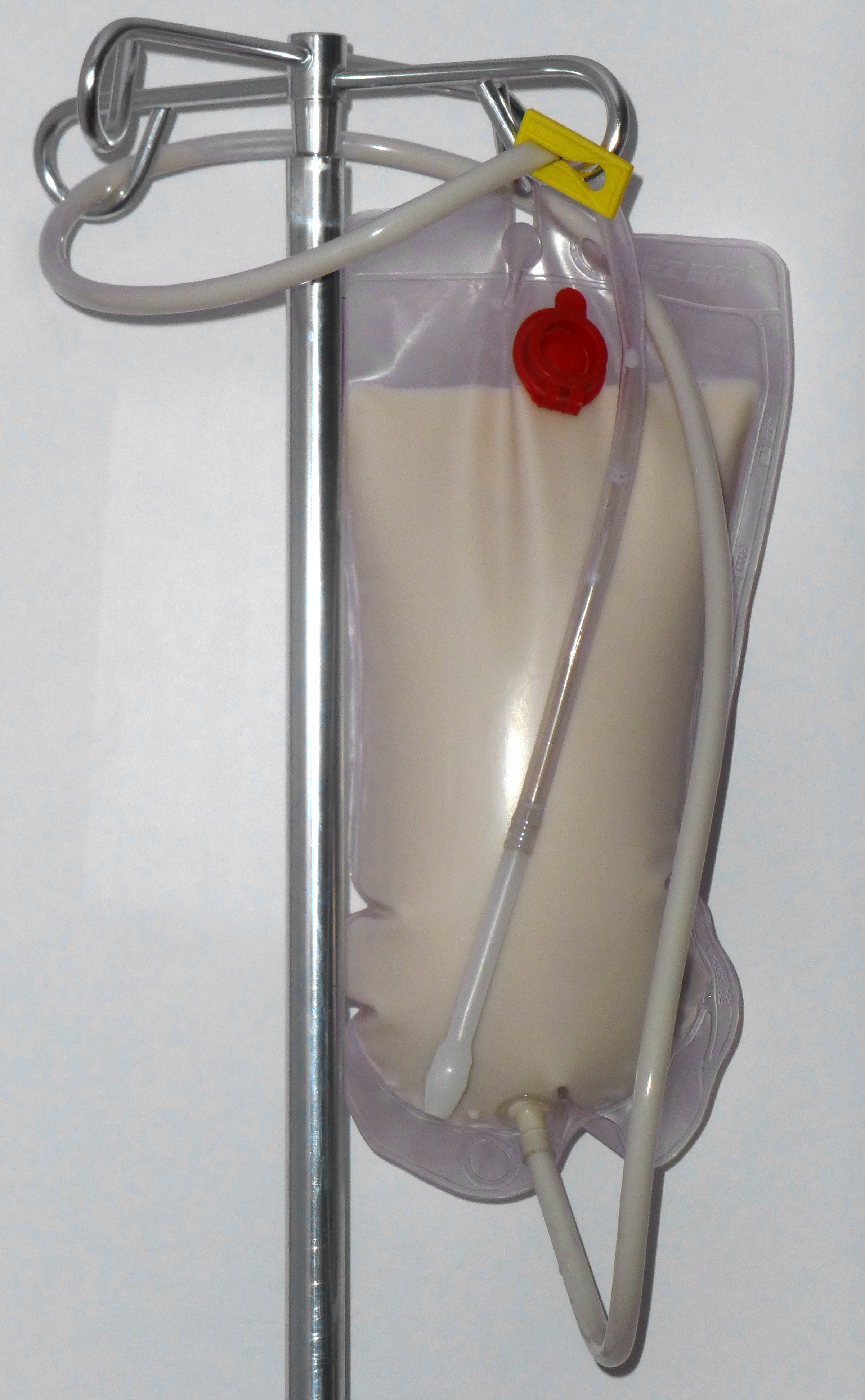 An enema bag system suspended to utilize gravity; lowering the height of the bag alters the flow rate and effectively manages the water pressure to prevent painful spasms.