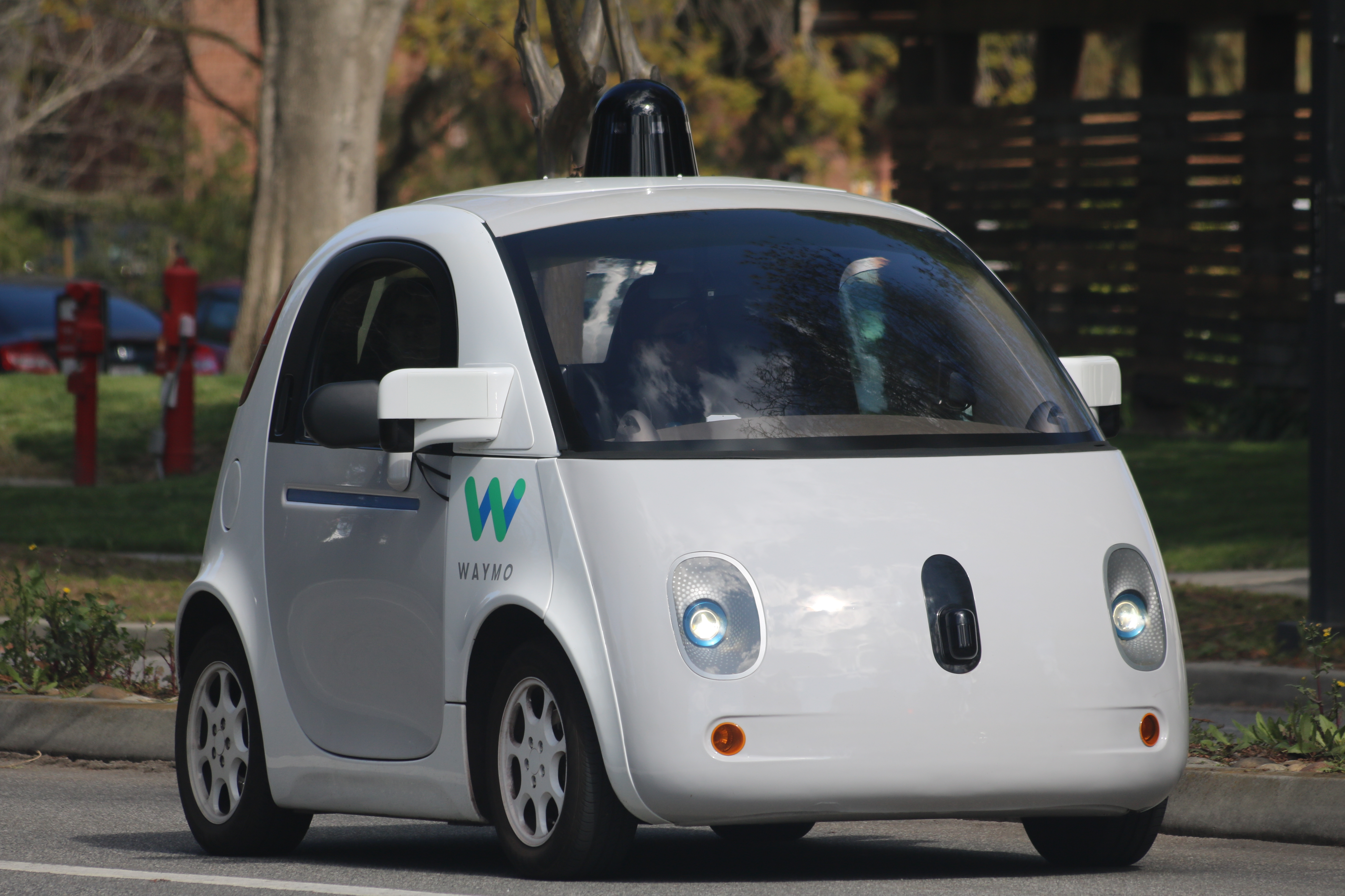 The development of autonomous vehicles represents a classic hybrid project: physical chassis manufacturing relies on predictive models, while complex navigation software requires adaptive, agile iterations.