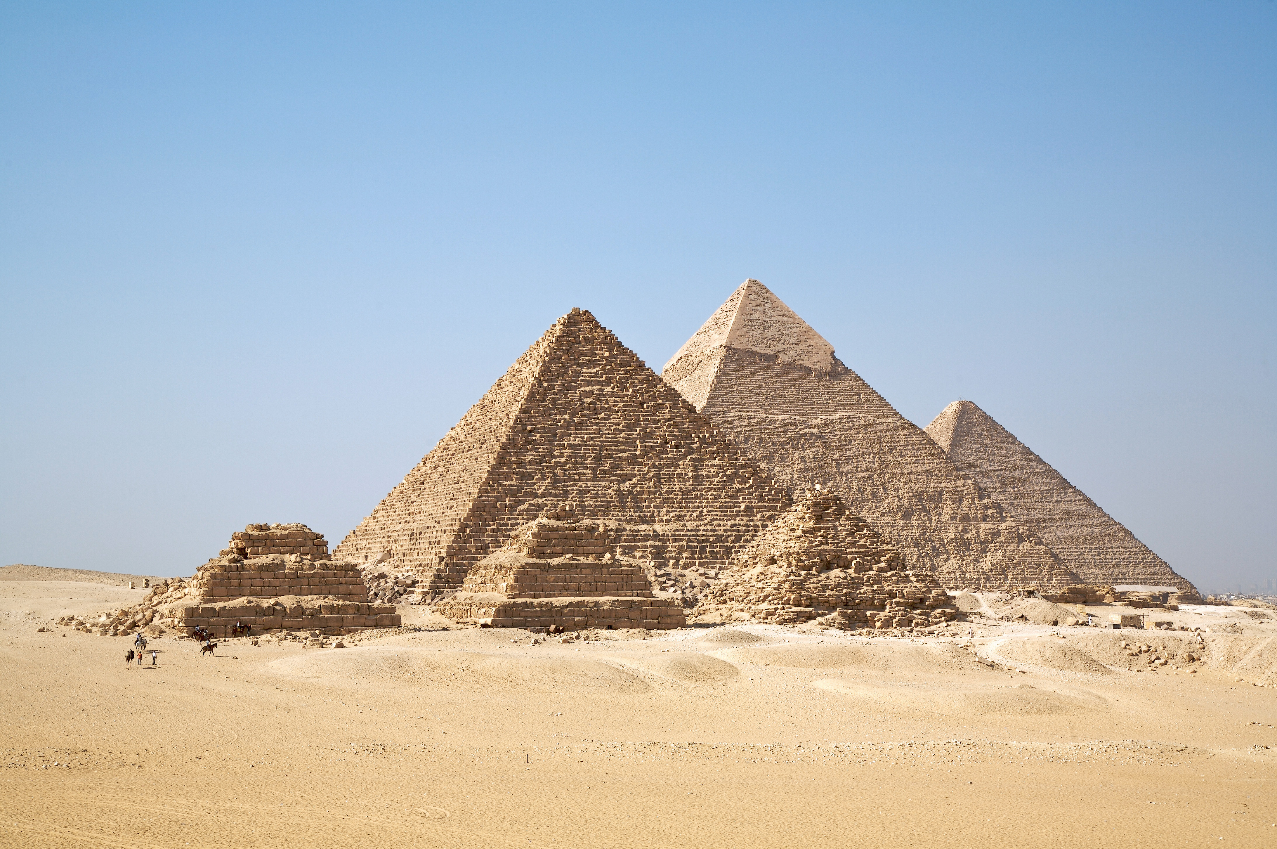 The Great Pyramids of Giza. Contrary to popular student misconceptions, these monumental tombs were constructed by paid agricultural laborers during the Nile's flood season, not enslaved people.