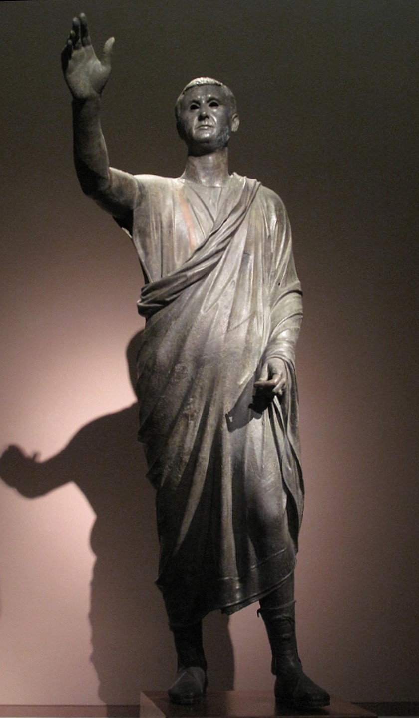 The classical Roman sculpture "The Orator" (c. 100 BCE) demonstrates how purposeful hand and arm gestures have been used for millennia to emphasize spoken arguments and command audience attention.