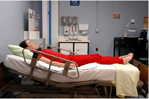 The semi-Fowler position elevates the maternal torso, preventing the heavy pregnant uterus from compressing the inferior vena cava and causing a dangerous drop in blood pressure.