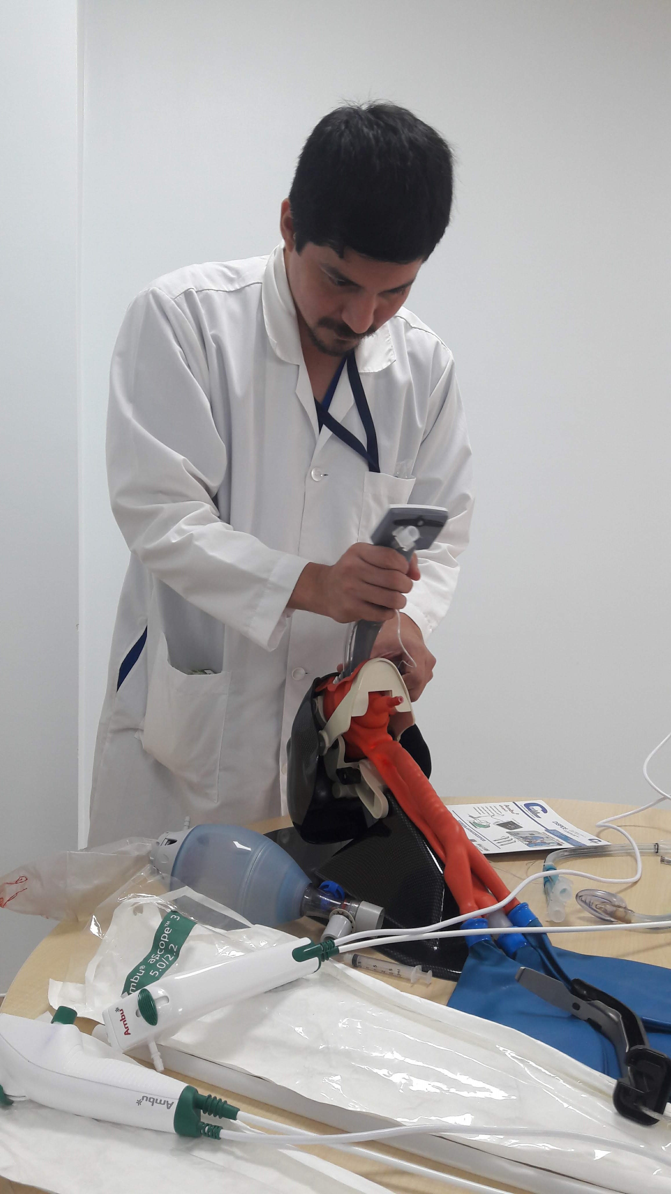 Endotracheal intubation using a laryngoscope. The nurse must fiercely advocate for the patient by intervening if other staff members attempt invasive procedures that explicitly contradict the patient's advance directive.