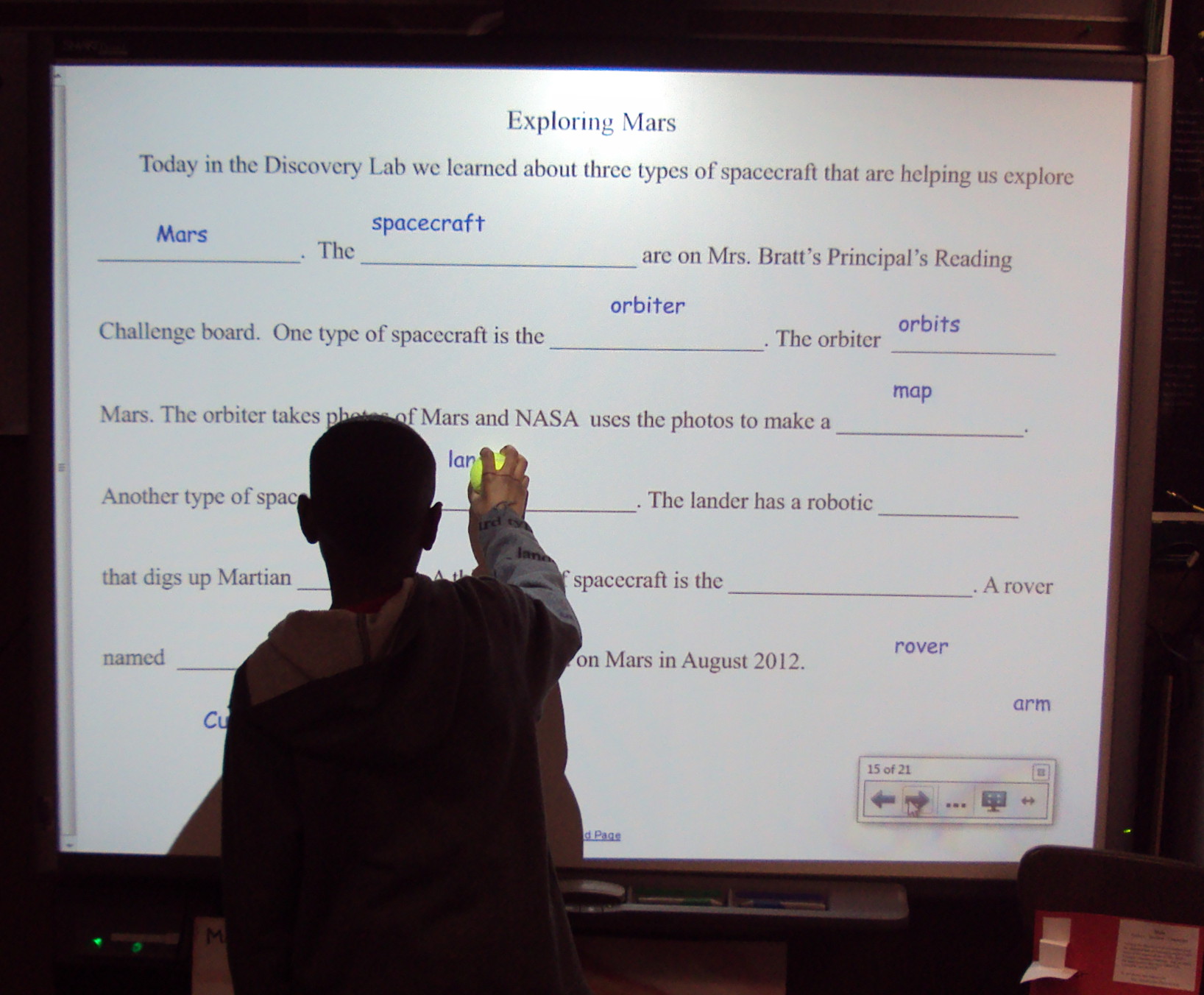 In a cloze procedure, students actively replace omitted words within a passage, demonstrating their ability to leverage context clues for reading comprehension.