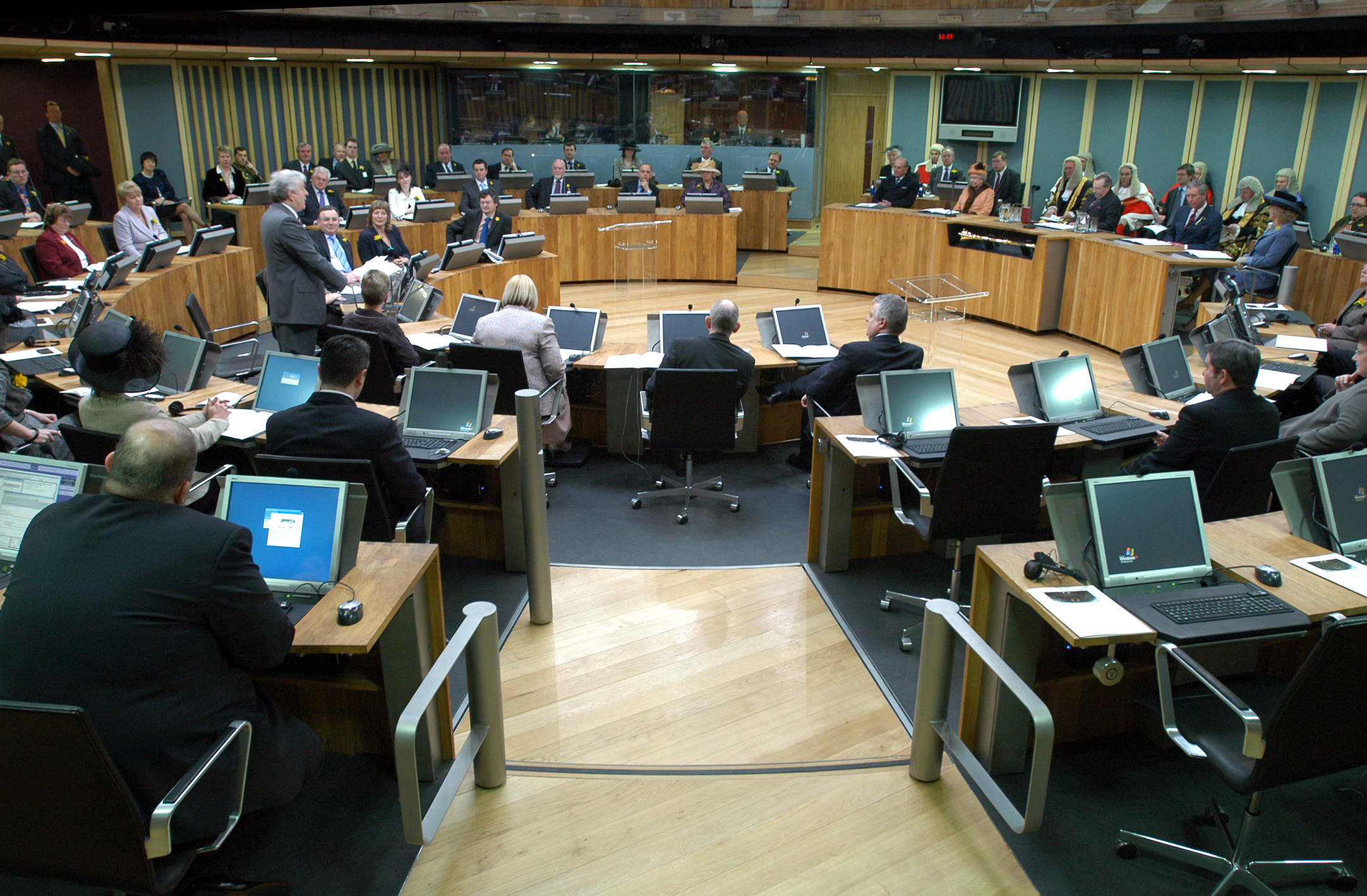 Members of the Senedd in a plenary session — the setting for the committee and floor votes that make up the Bill's four legislative stages.
