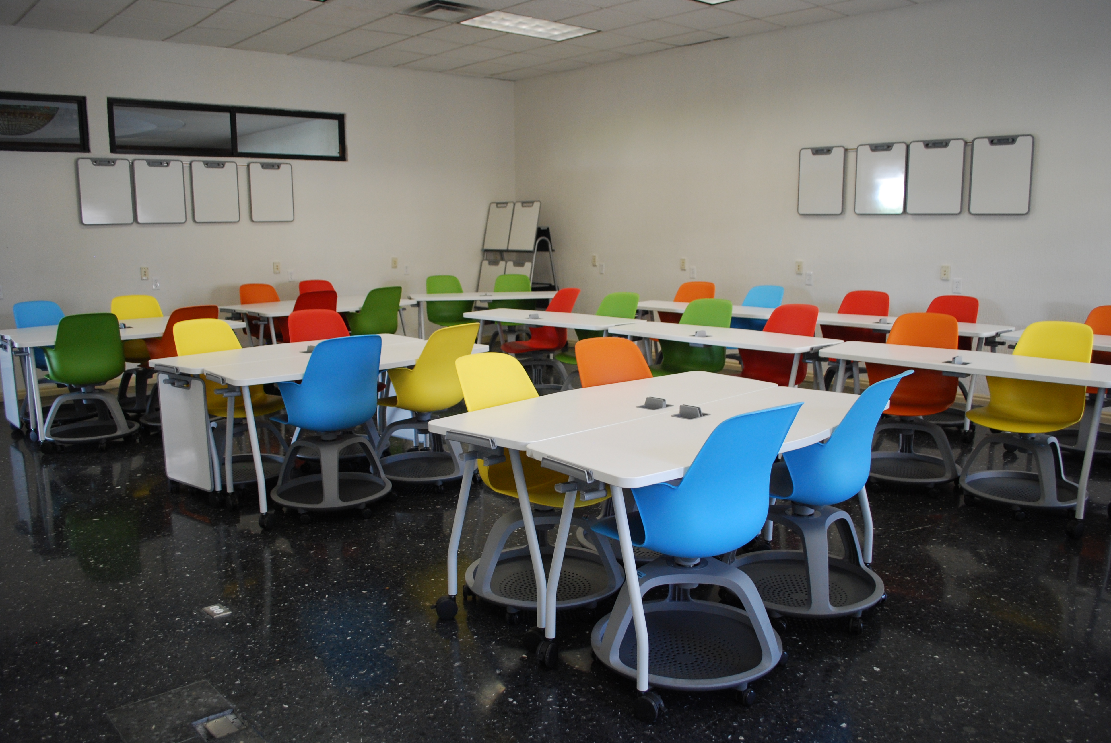 Classrooms equipped with moveable furniture allow educators to intentionally engineer wide, unobstructed pathways that accommodate wheelchairs and safely regulate student traffic.