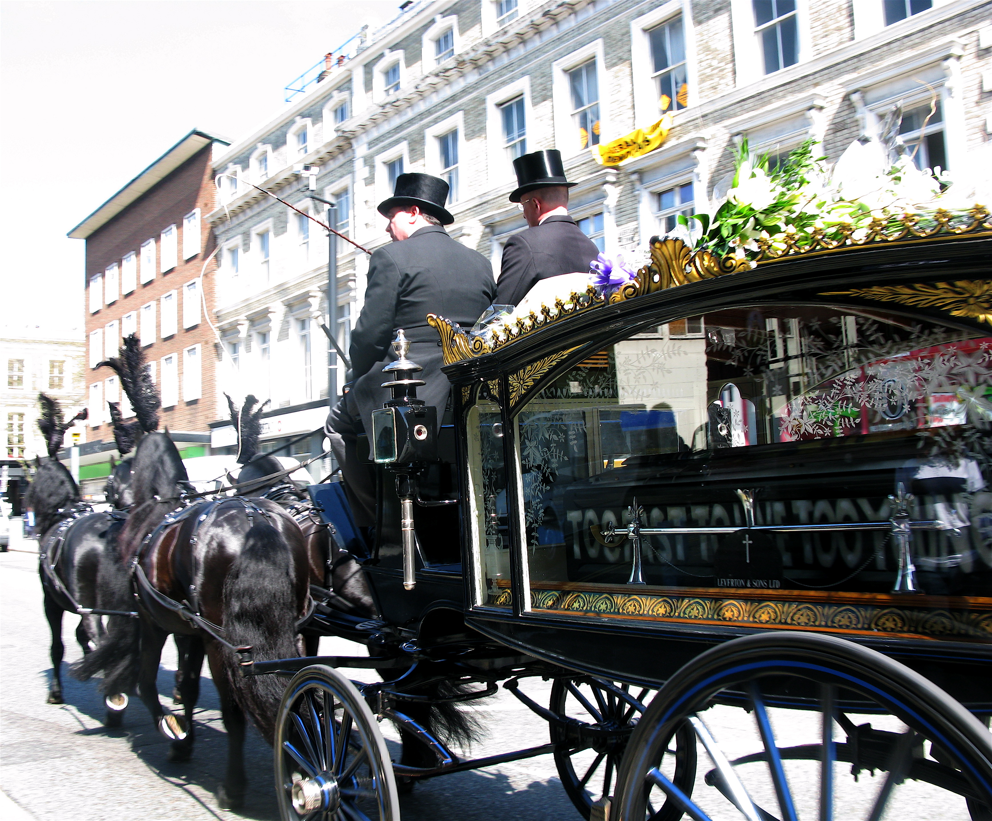 Funeral directors driving a hearse in a funeral procession — the other statutory carve-out from the section 11 notice requirement.