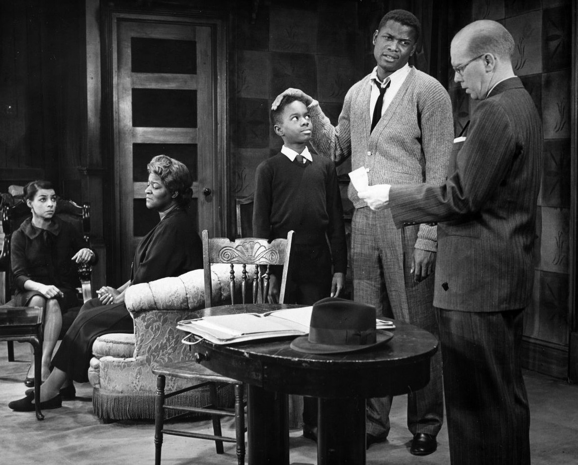 A 1959 stage production of Lorraine Hansberry's "A Raisin in the Sun." By pairing this dramatic play with Langston Hughes's poetry, students can analyze how identical themes of deferred dreams are developed across vastly different literary genres.