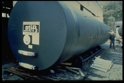 A commercial underground storage tank (UST) shown prior to installation. Over decades, abandoned or neglected steel tanks can corrode and leak petroleum, causing catastrophic groundwater contamination and massive financial liability.