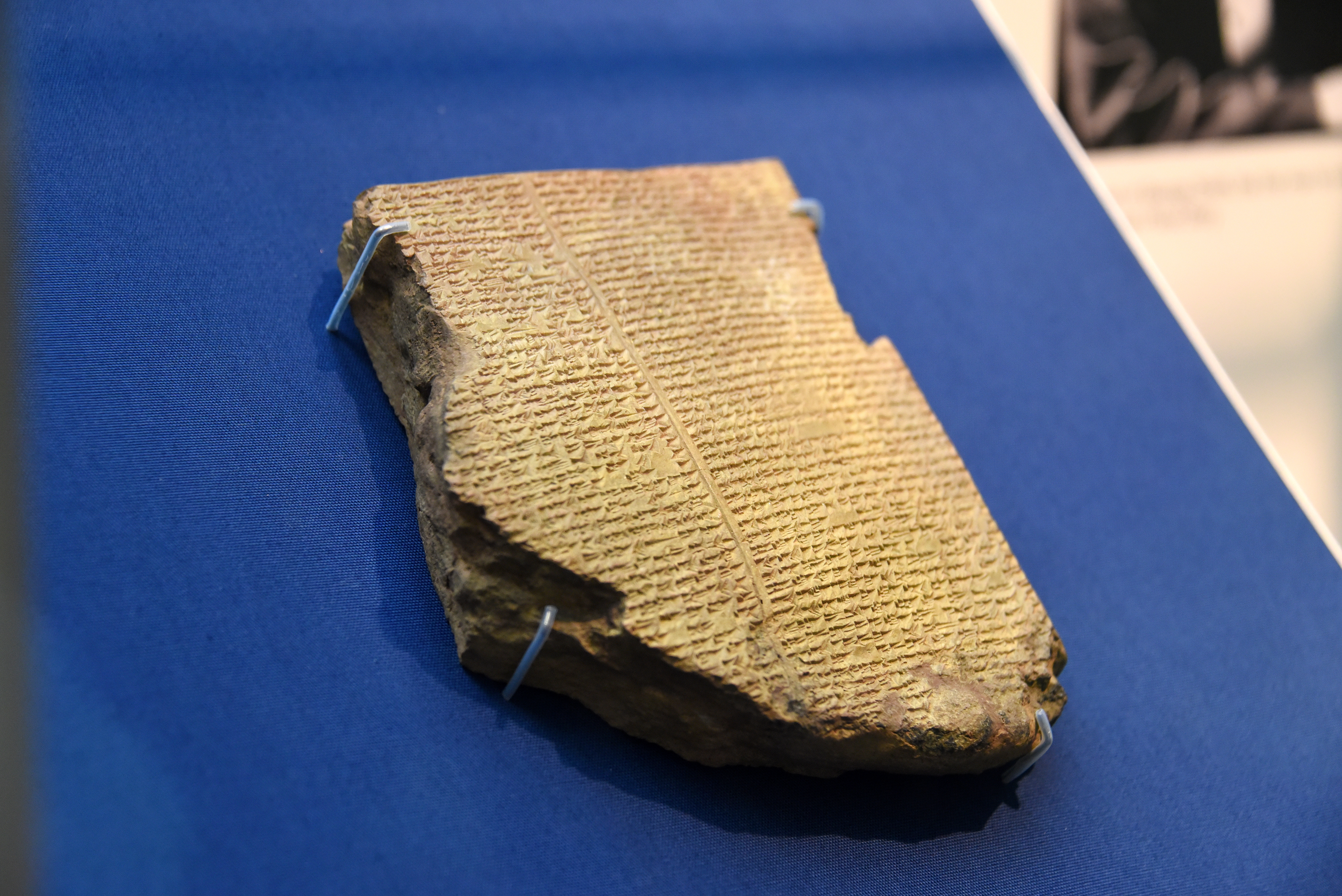 Tablet XI of the Epic of Gilgamesh. Recorded on ancient clay tablets, this text establishes the foundational narrative arc of the heroic quest that echoes throughout global literature.