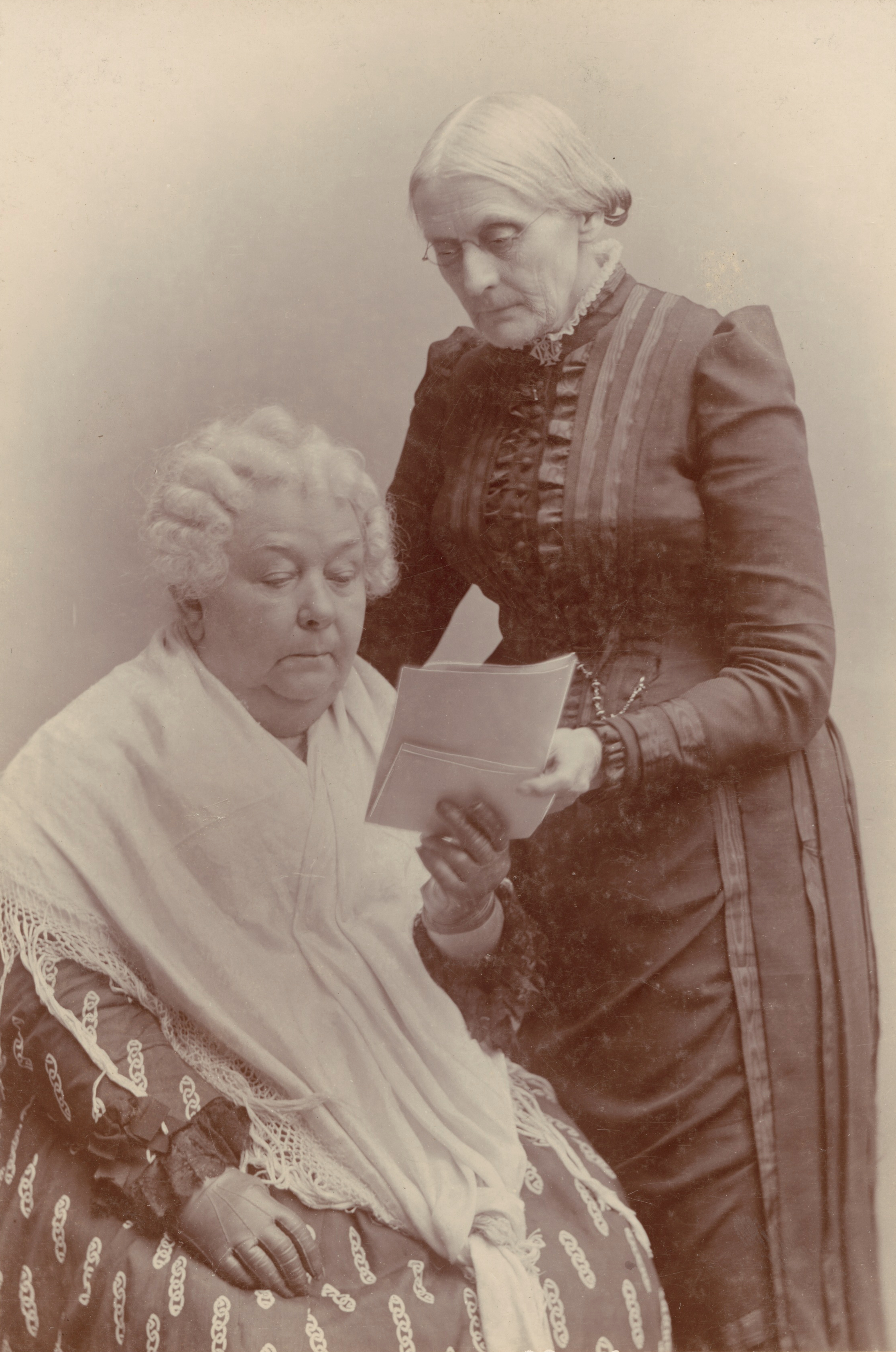 Elizabeth Cady Stanton (seated) and Susan B. Anthony. These two activists were the primary architects of the early women's suffrage movement, framing the century-long fight for equality.