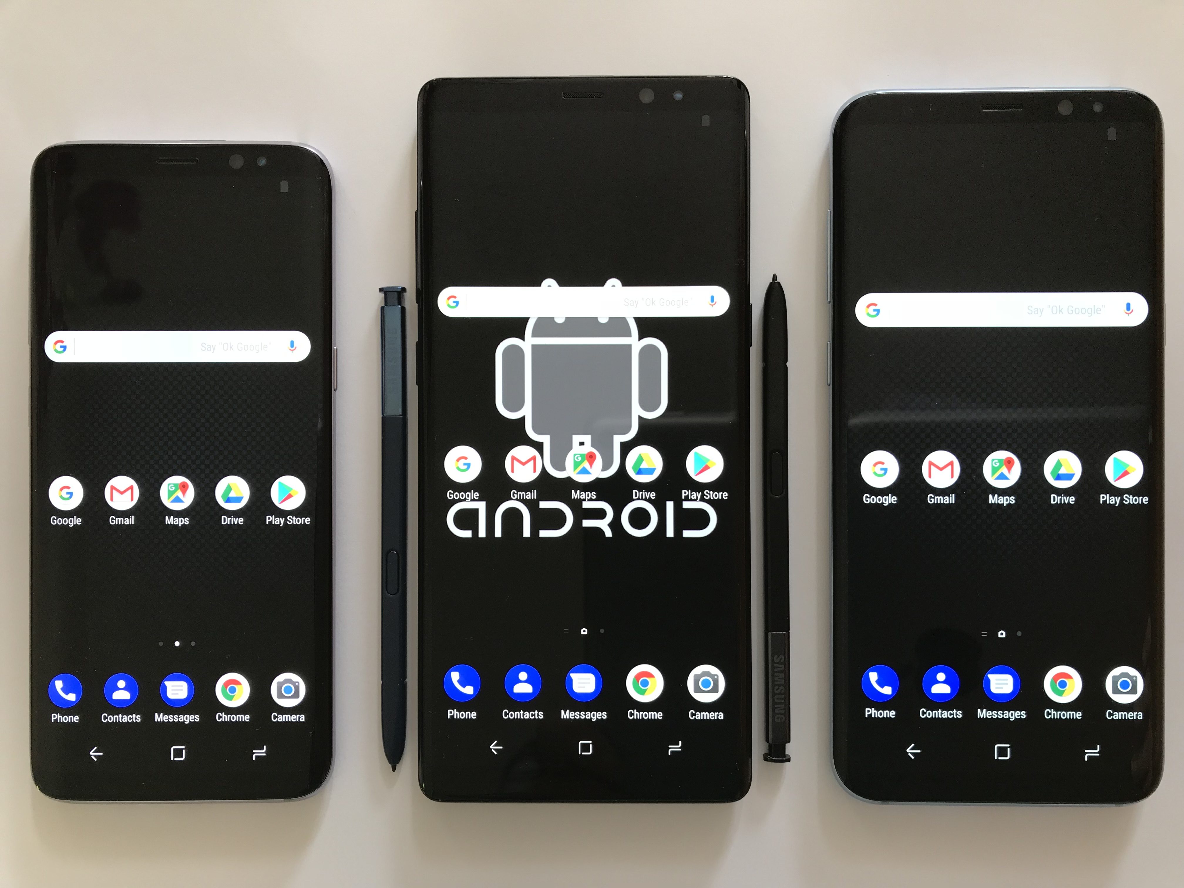 A variety of smartphone devices illustrating how Android's open-source model allows multiple distinct hardware manufacturers to utilize and customize the same foundational operating system.