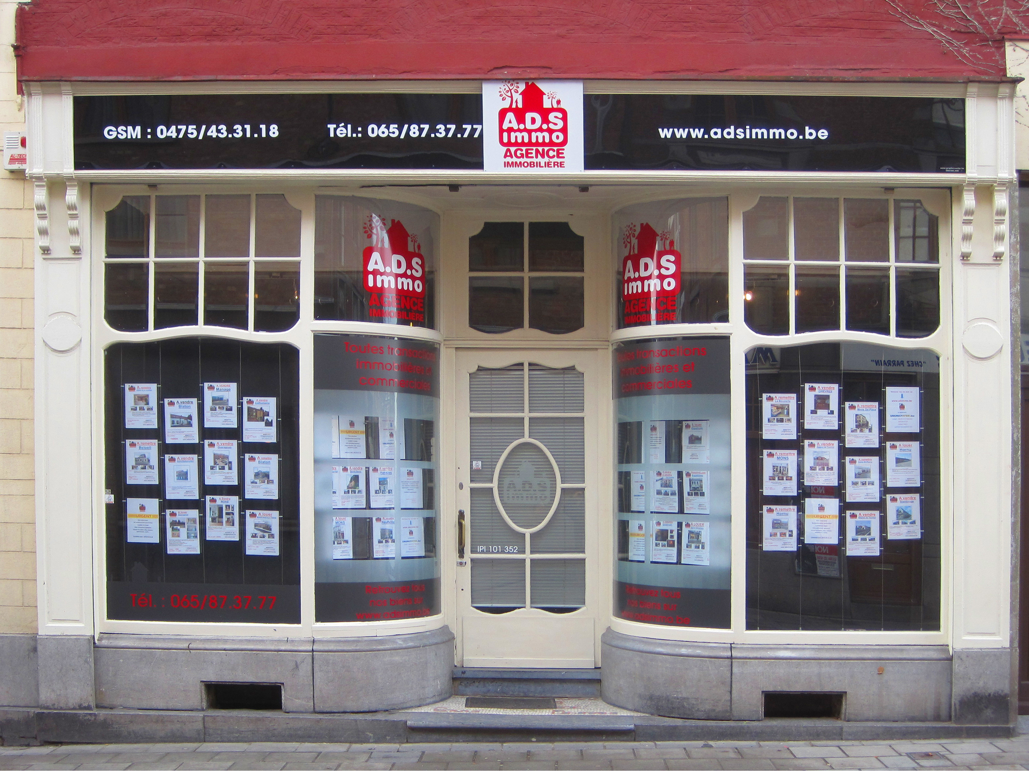An estate agency shopfront — estate agents' fees on sale are a classic example of the incidental costs of disposal that are deductible in a CGT computation.