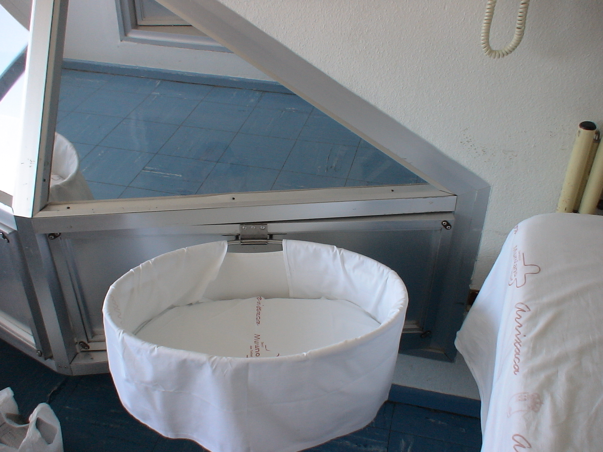 Rolling bassinets are mandated for neonatal transport within the facility to prevent accidental drops and to systematically deter casual abduction attempts.