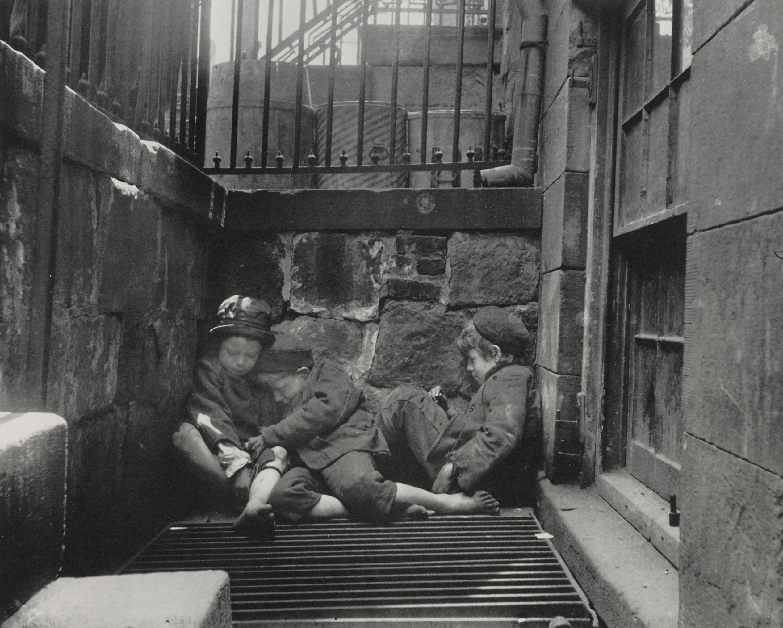 A photograph by Jacob Riis showing homeless children sleeping on the streets of New York. Show this to students to demonstrate how photojournalism exposed the harsh realities of urban slums.