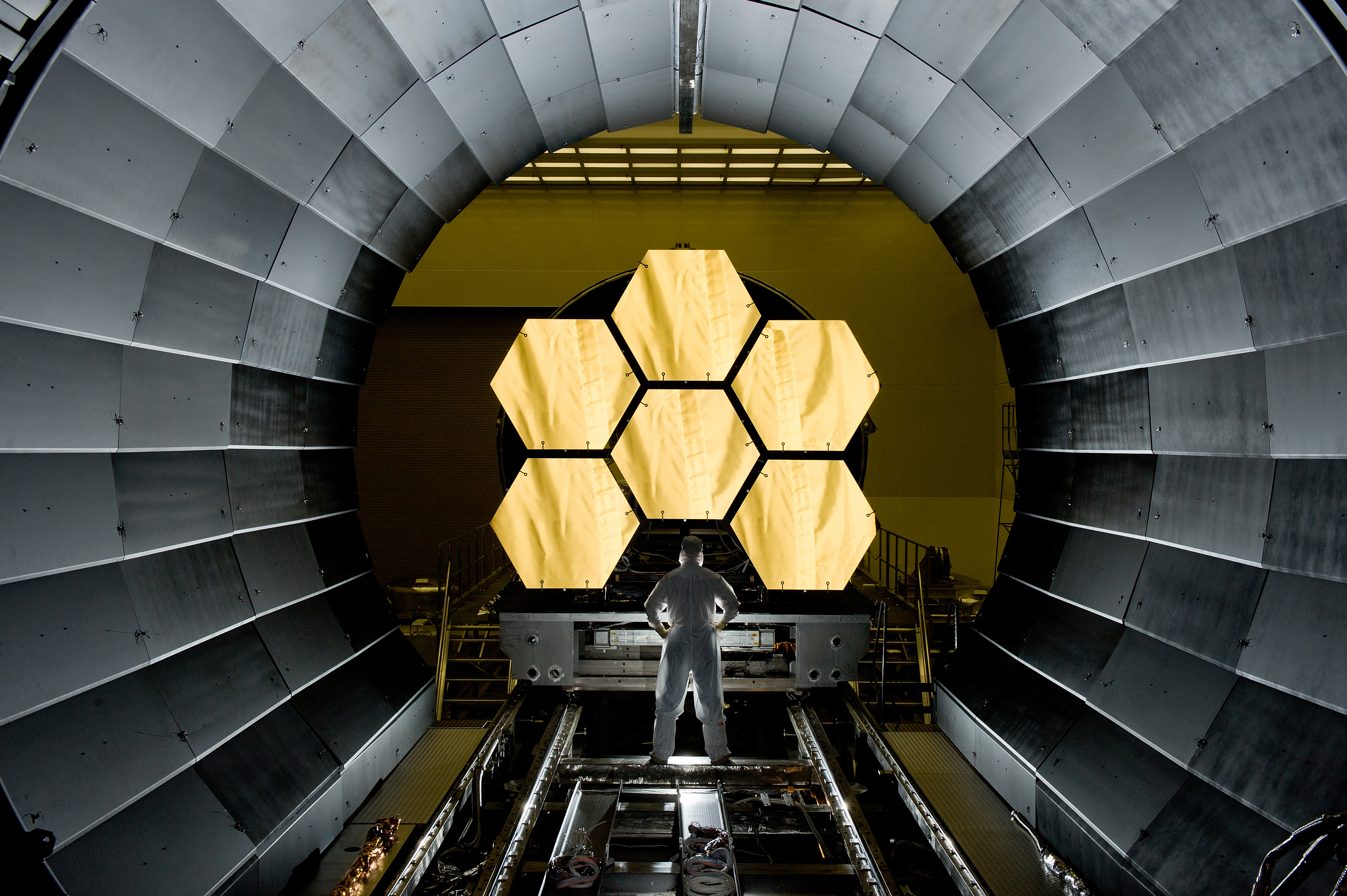 Accepted deliverables, such as the primary mirrors of the James Webb Space Telescope undergoing rigorous acceptance testing, are mandatory inputs that validate a project is ready for formal closure.