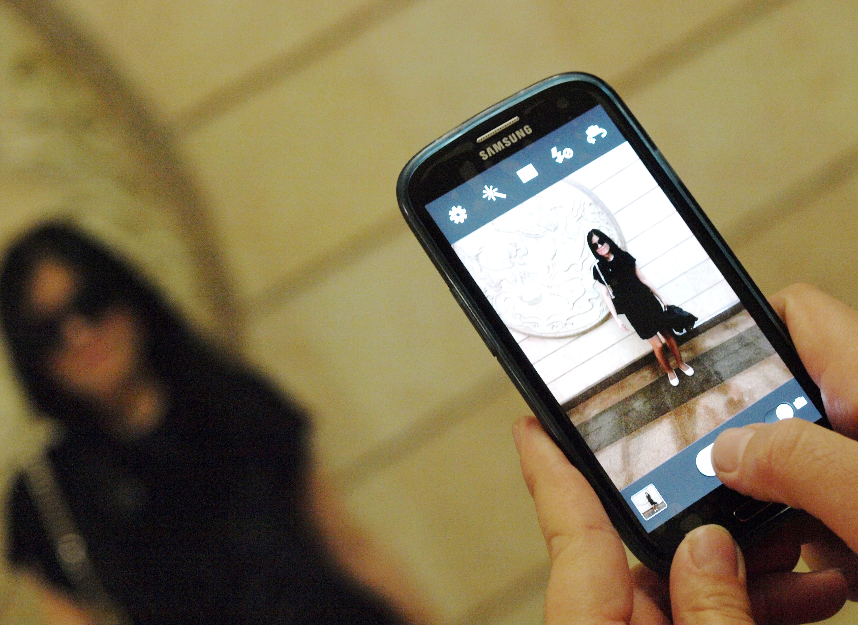 Personal mobile devices equipped with built-in cameras pose a significant risk to the privacy of other vulnerable clients on a psychiatric unit and represent a major HIPAA liability.