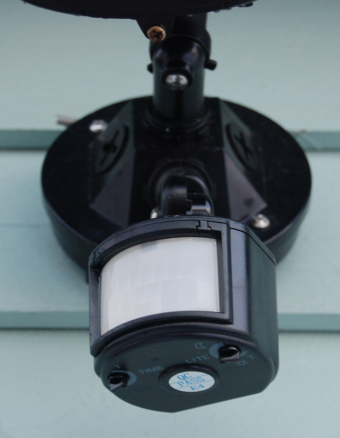 A motion detector acts as a physical detective control, designed to identify and record an unauthorized physical presence after an intrusion has occurred.