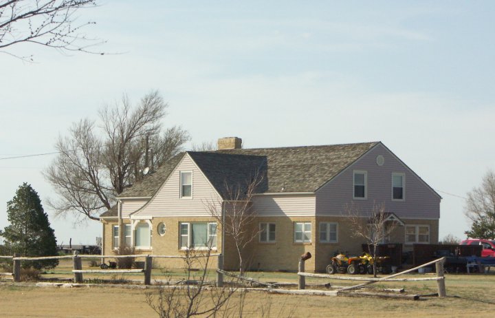The former Clutter home in Kansas, the real-world setting of the murders investigated in Truman Capote's In Cold Blood, illustrating the application of novelistic settings to true events.