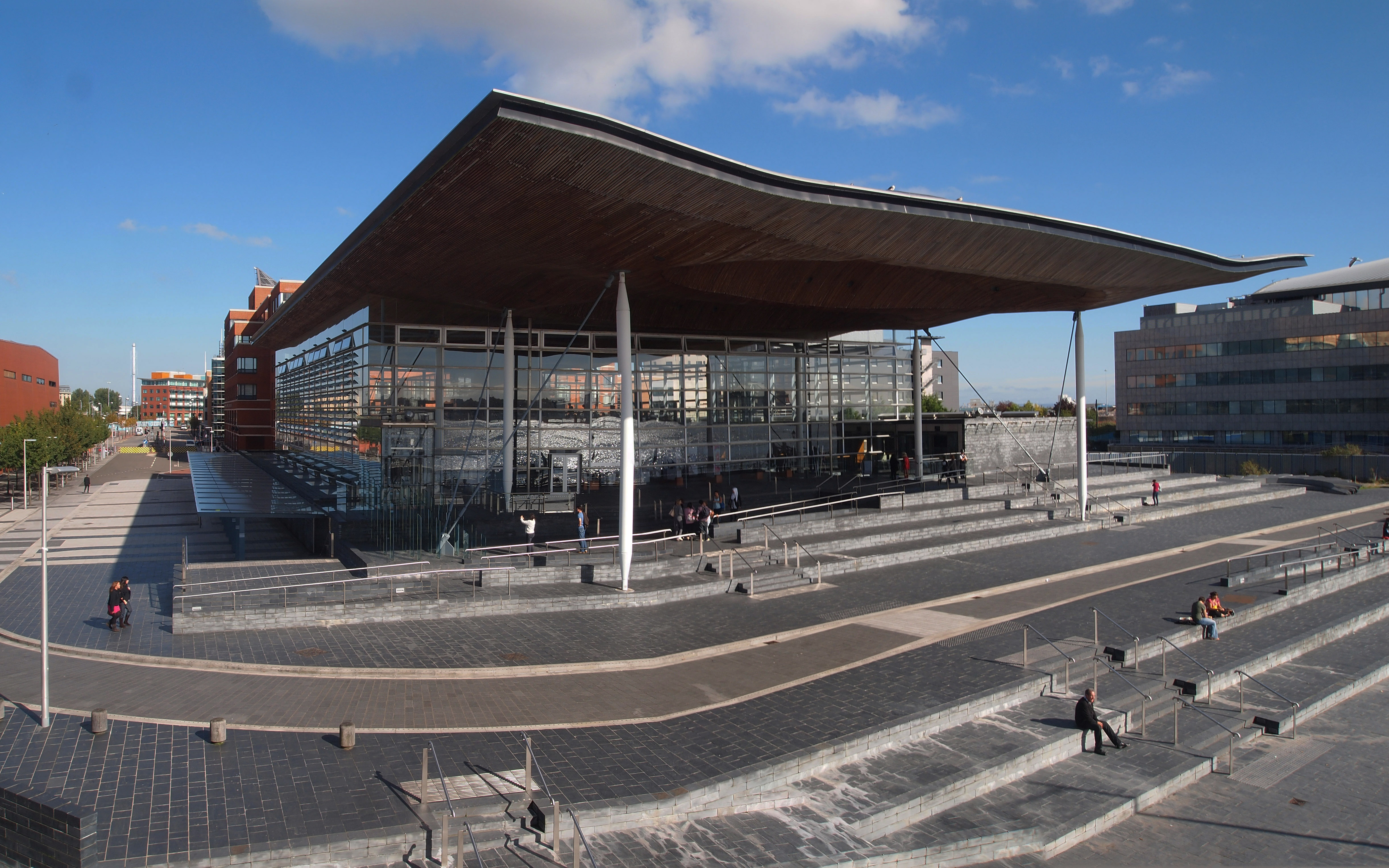 The Senedd building in Cardiff Bay, home to the Welsh Parliament created through the devolution Acts of 1998, 2006, and 2017.