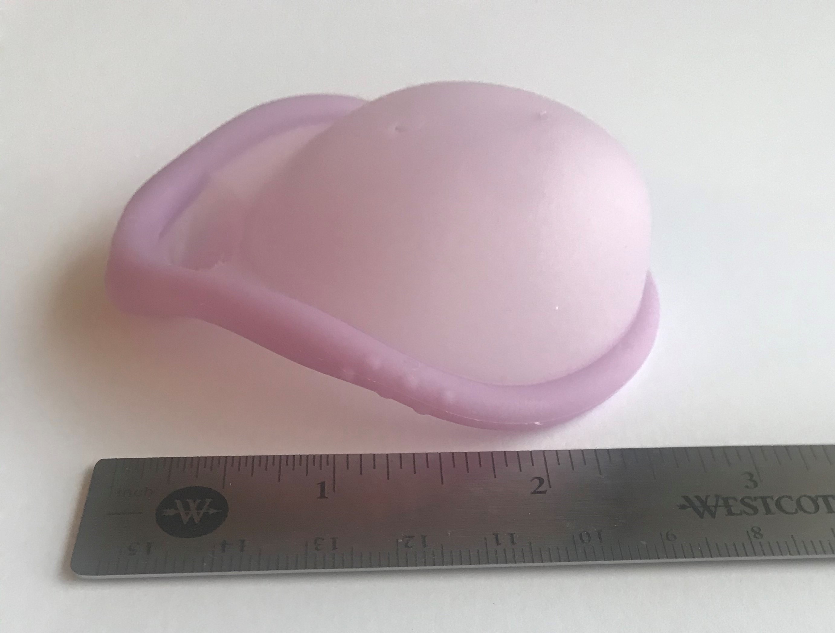 A contraceptive diaphragm, which acts as both a physical barrier and a vehicle to hold spermicidal jelly directly against the cervix.