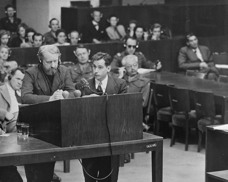 A prosecutor cross-examines a defendant at trial — the kind of oral credibility-testing that a summary judgment hearing, built on witness statements alone, cannot provide.