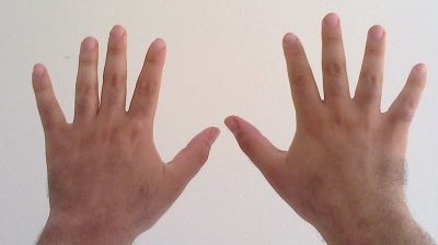 The biological origin of the base-10 numeral system is widely believed to stem from humans naturally counting on their ten fingers.