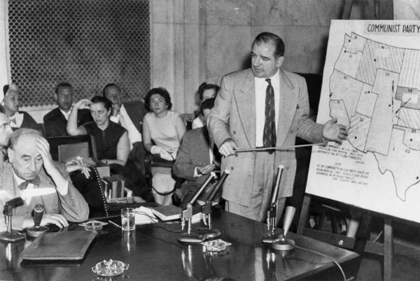 Chief counsel Joseph N. Welch (left) confronts Senator Joseph McCarthy during the televised Army-McCarthy hearings of 1954, which exposed McCarthy's aggressive tactics.