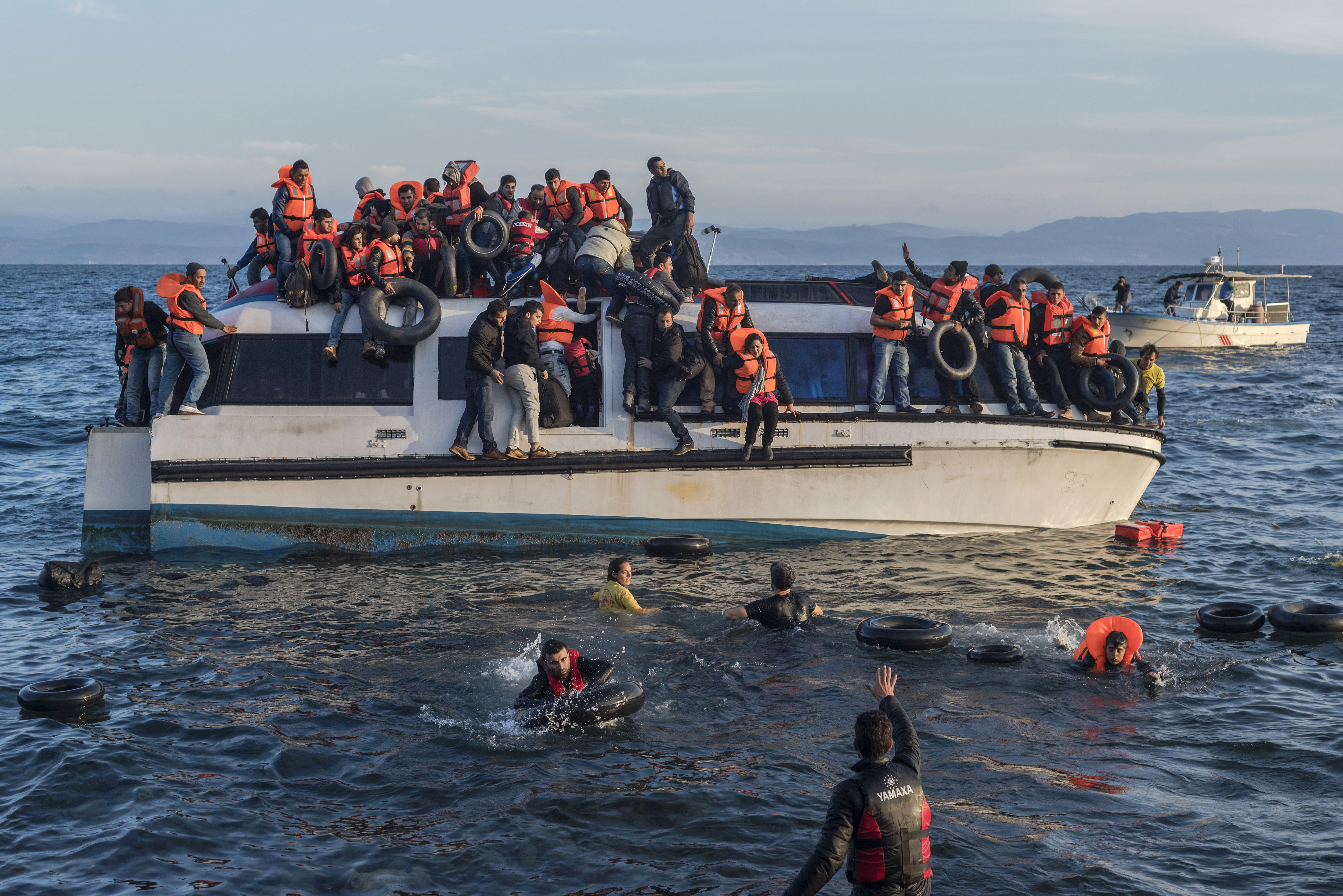 Refugees from Syria and Iraq arriving in Greece in 2015. Unlike internally displaced persons (IDPs), refugees have crossed an international border to seek safety from conflict.