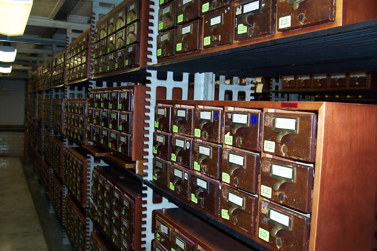 Like a physical library catalog, a file system provides the structural indexes and rules necessary to organize, locate, and retrieve specific data from an otherwise chaotic storage medium.