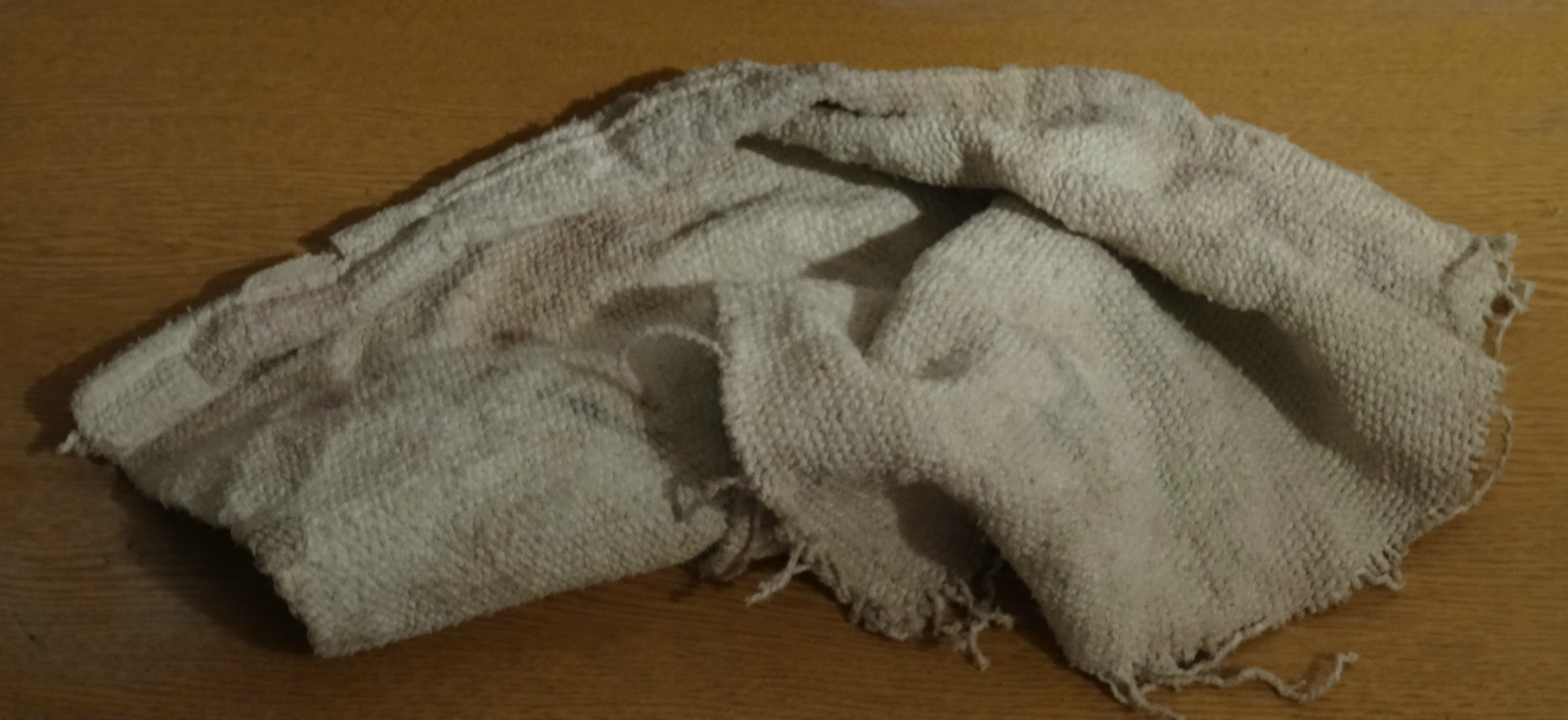 Asbestos fabric — the substance to which the Rothwell claimants were occupationally exposed; their pleural plaques were symptomless markers, not the disease itself, and so grounded no claim for fear of future illness.