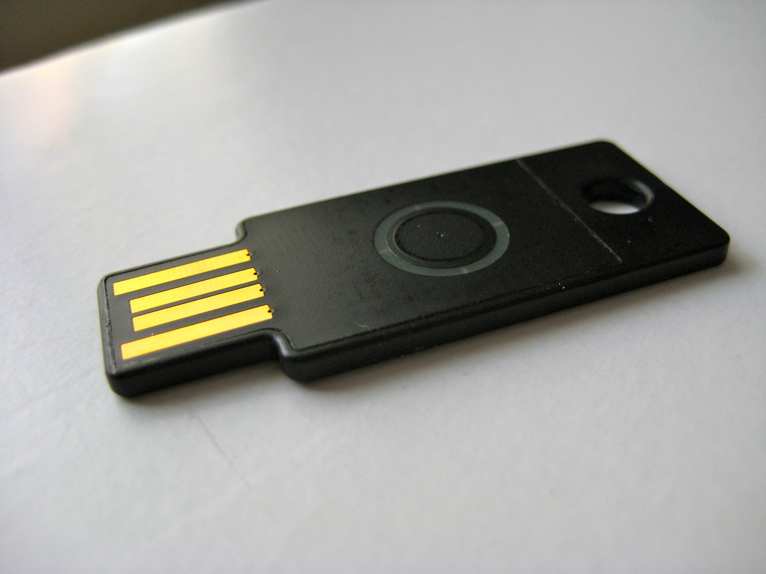 A USB hardware security token, which functions as a strong possession factor ("something you have") to prevent remote adversaries from logging in, even if they steal a user's password.