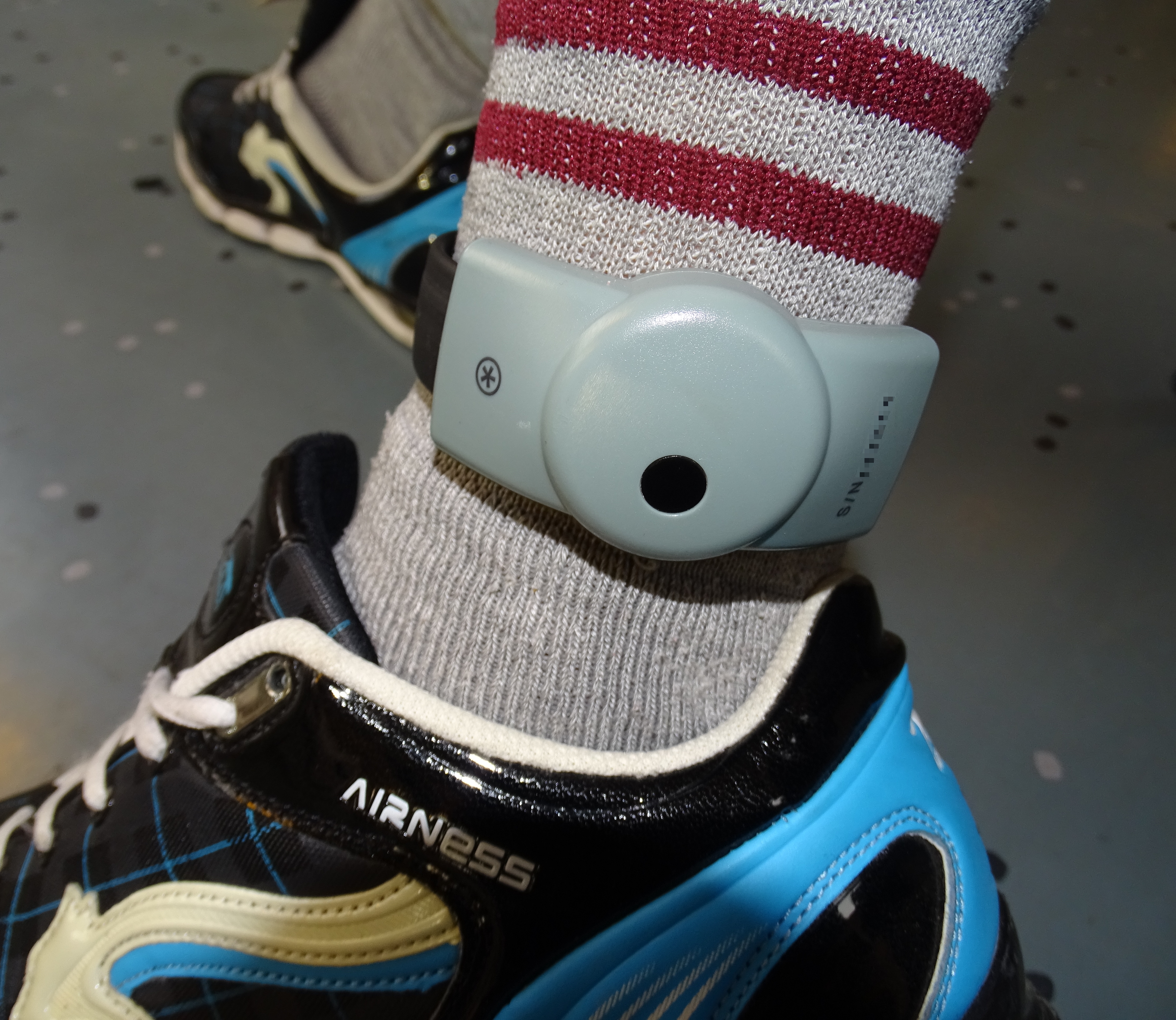 An electronic ankle tag — used to enforce a curfew condition, one of the common conditions a court may attach to bail to manage absconding or reoffending risk.