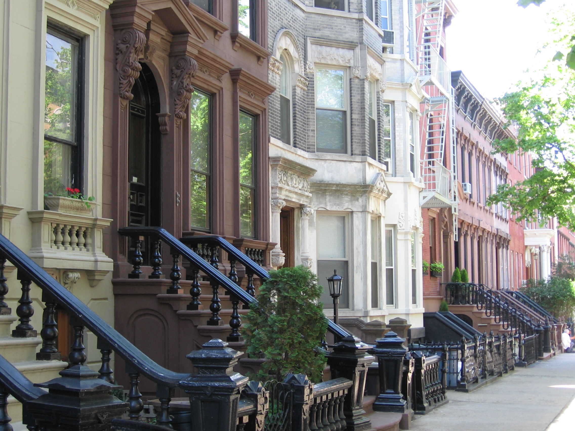 An exclusive right to sell agreement provides a protective boundary around a listing, such as these Brooklyn rowhouses, ensuring the broker earns a commission regardless of who finds the buyer.