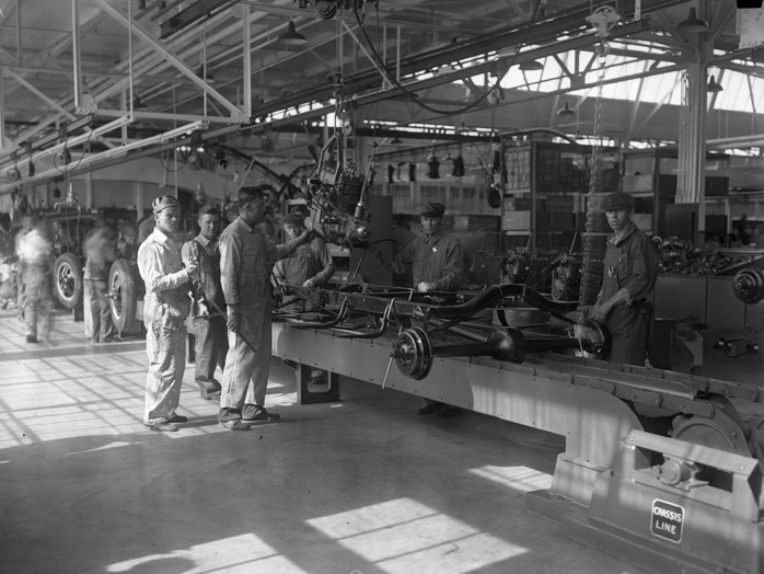 An automotive assembly line exemplifies ongoing operations, where the goal is continuous, efficient, and highly repetitive production of uniform goods.