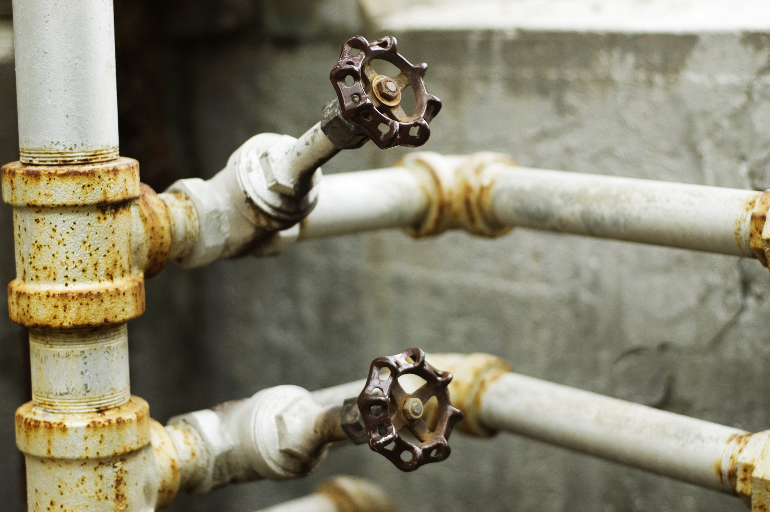 Traditional network administration relied on manual, device-by-device configuration, much like manually turning individual physical water valves.
