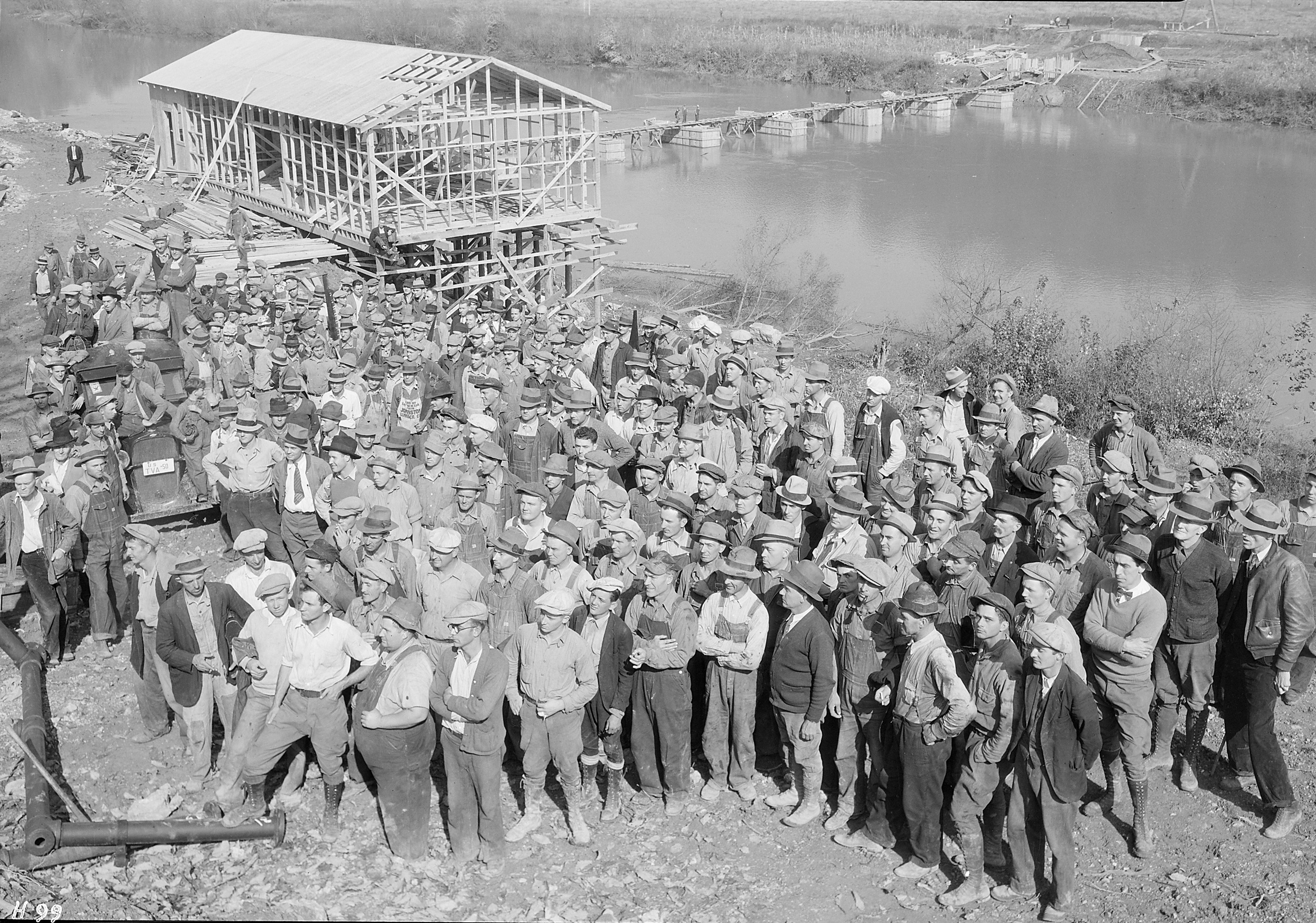 Workers constructing the Norris Dam in 1933. The Tennessee Valley Authority (TVA) embodied the New Deal's dual focus on relief and recovery by providing immediate jobs while permanently modernizing the rural South's infrastructure.