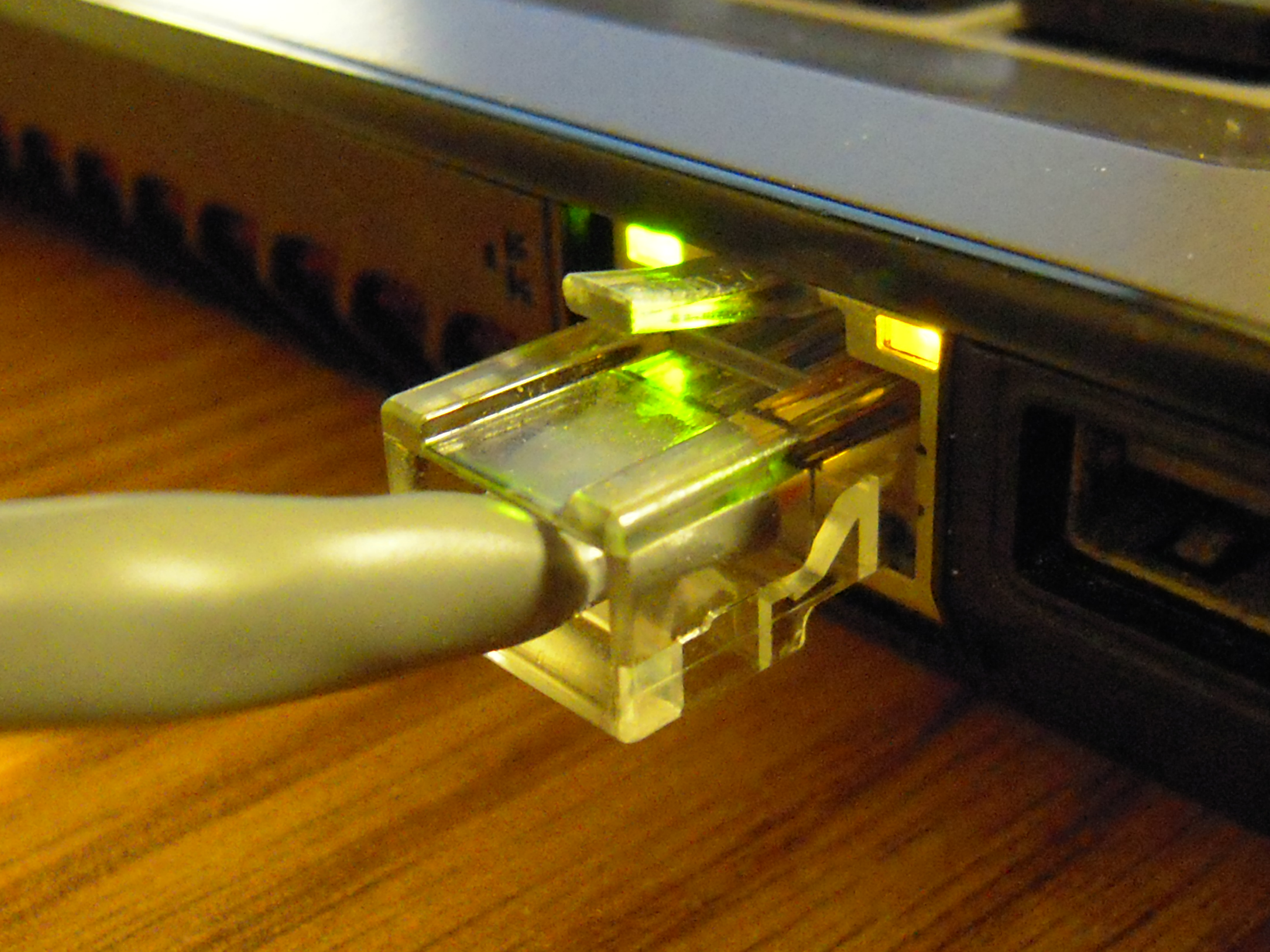 Physical disconnection of the Ethernet cable ensures an infected machine is completely severed from the wired network, cutting off the malware's ability to spread laterally or communicate externally.