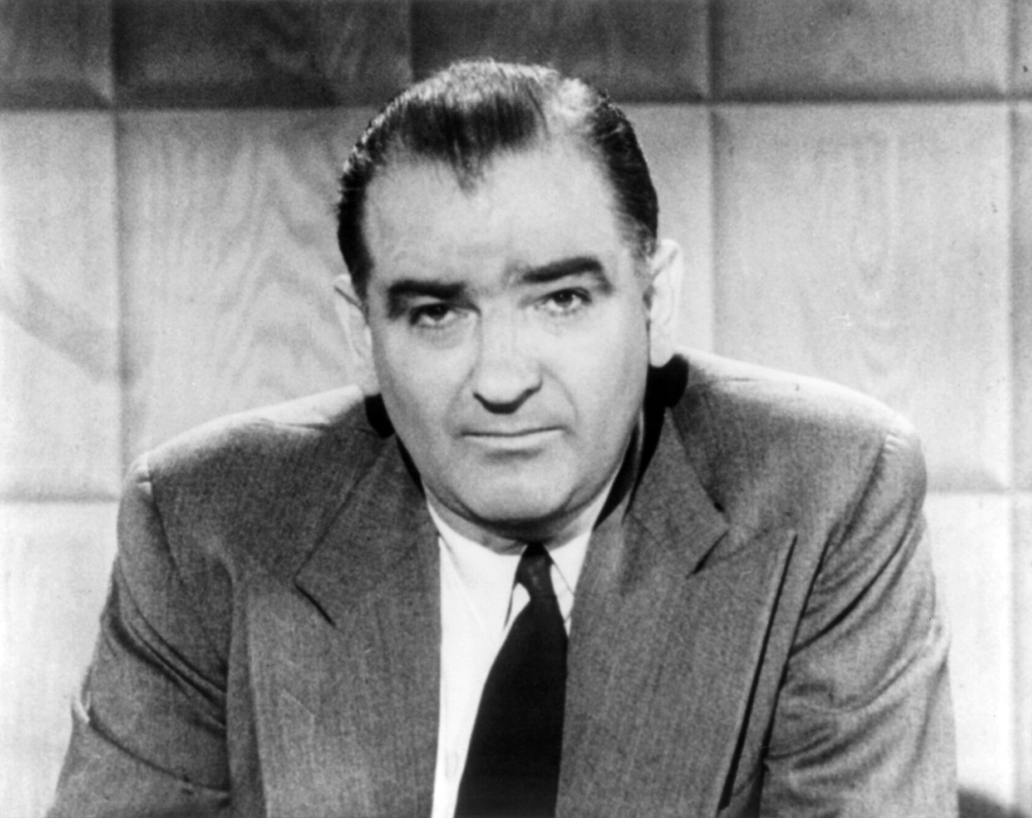 Senator Joseph McCarthy in 1954. His aggressive anti-communist hearings served as the direct political allegory for Arthur Miller's "The Crucible."
