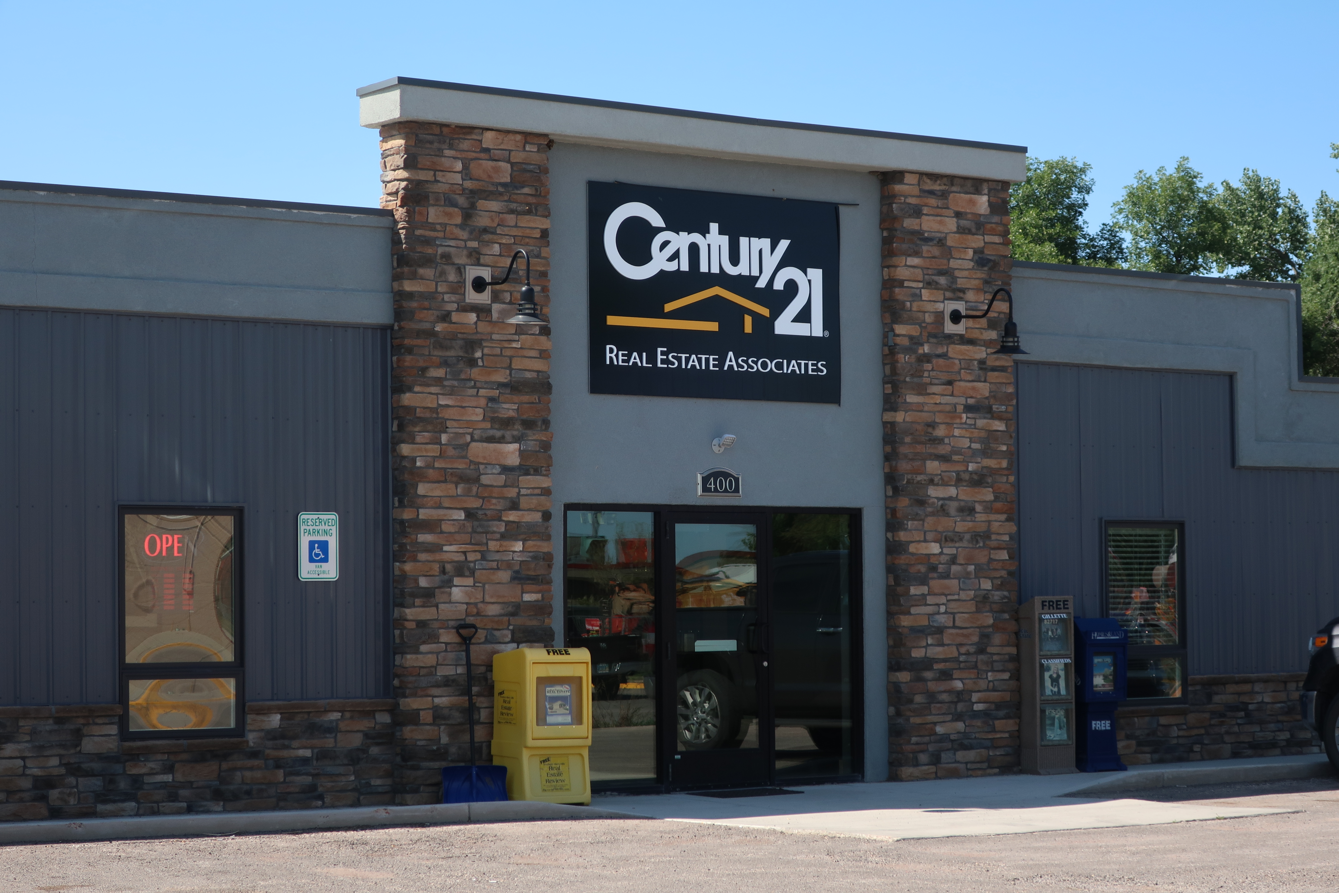 A local franchised brokerage. Because national brands can obscure local liability, New Jersey law requires franchise advertisements to explicitly state that the specific office is independently owned and operated.